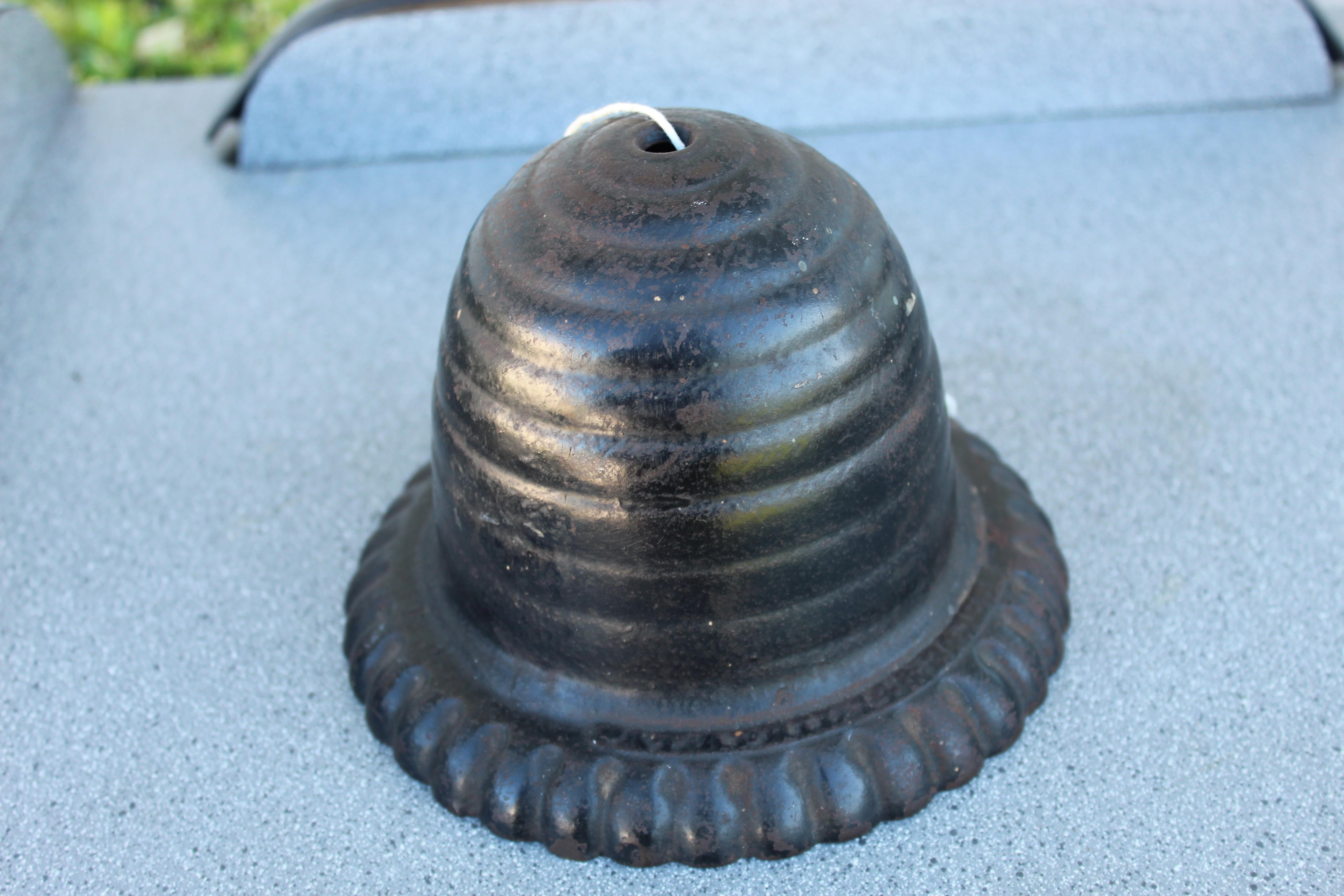 Antique cast iron bee hive string holder. This is a very old cast iron string holder that is in very nice condition.
It has its original bottom twist door. This is a very usable old string holder. Mostly used in the 19th century general