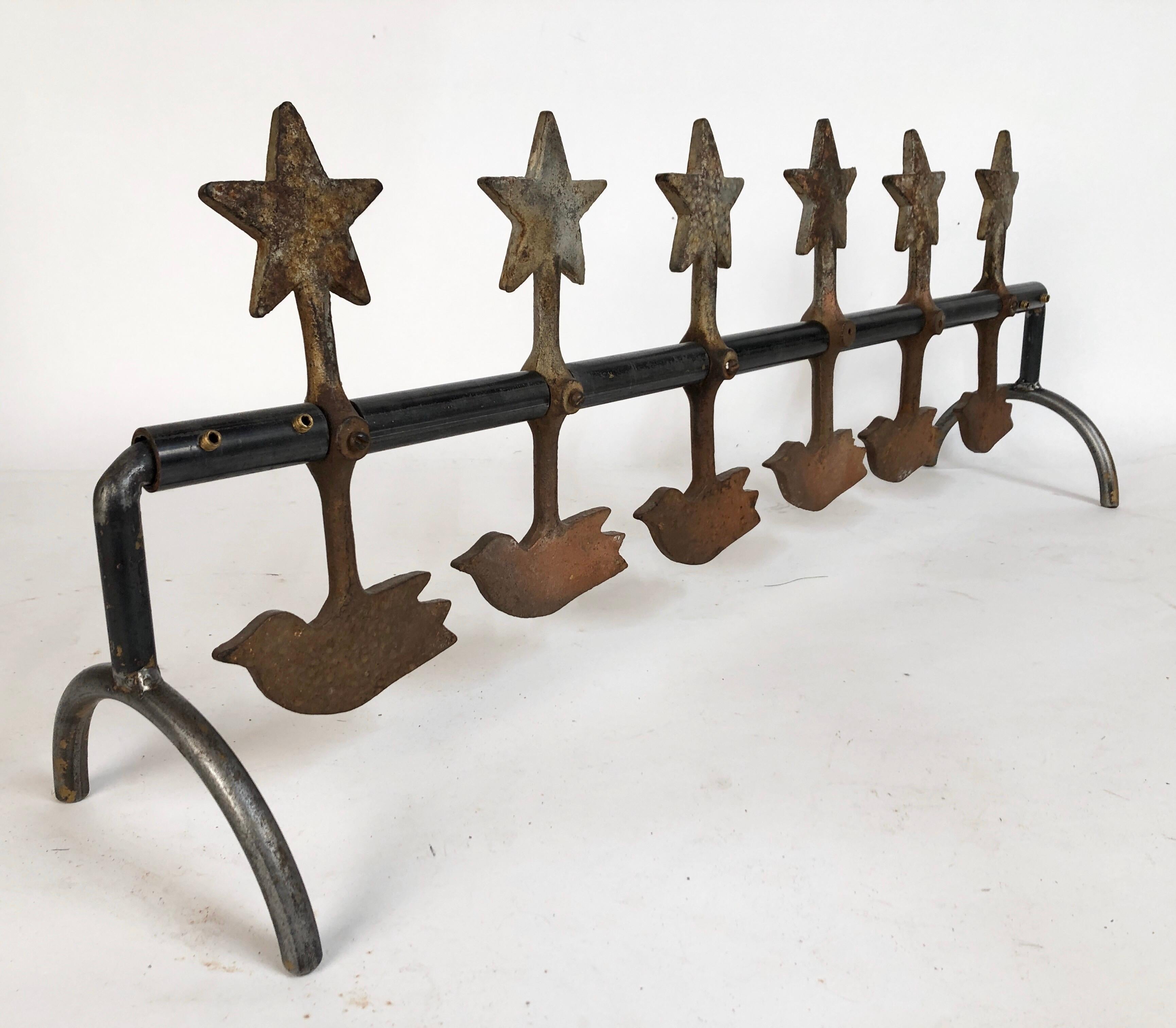 Antique cast iron spinning birds and stars shooting gallery targets with original untouched surface. Measures 29