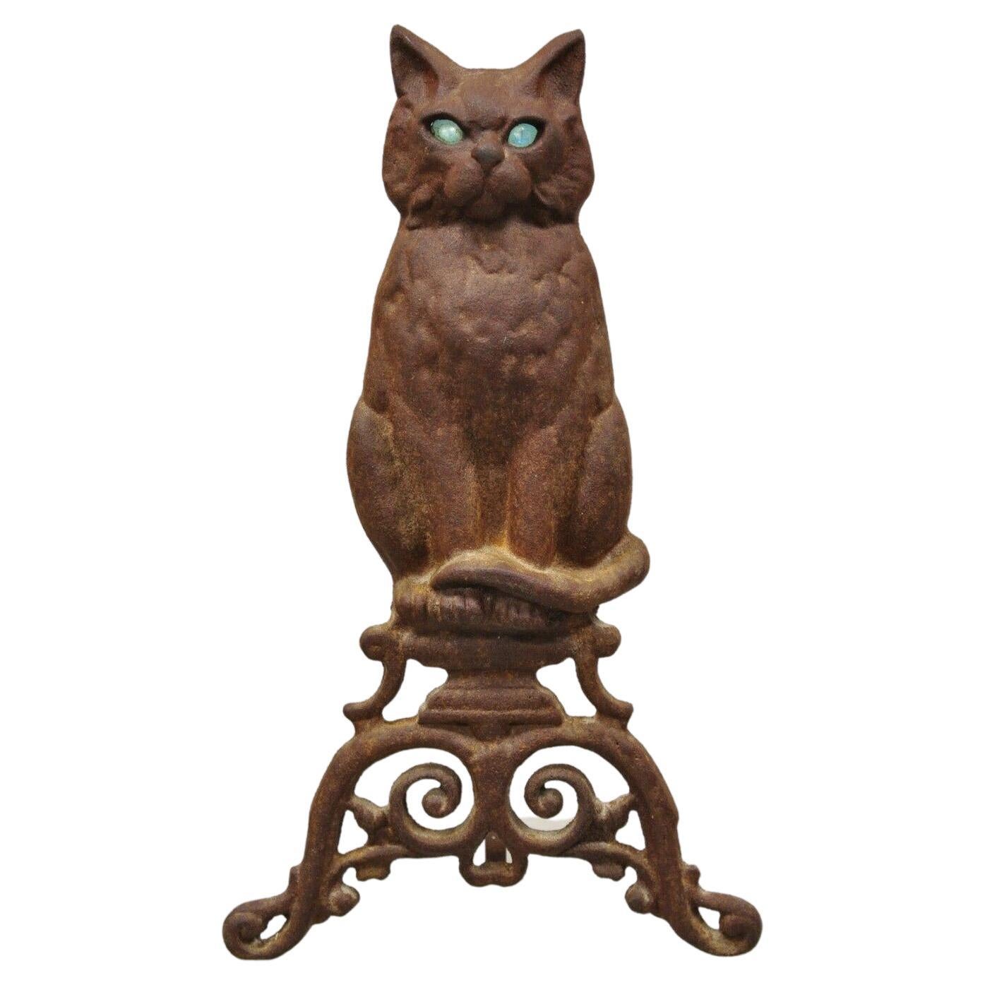 https://a.1stdibscdn.com/antique-cast-iron-blue-glass-eyes-figural-cat-door-stop-andiron-for-sale/f_9341/f_333453621679055414744/f_33345362_1679055415178_bg_processed.jpg