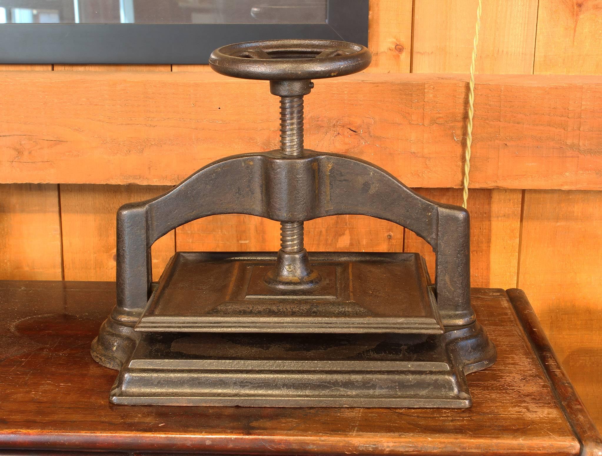 Antique cast-iron book press. Measures 18 3/4