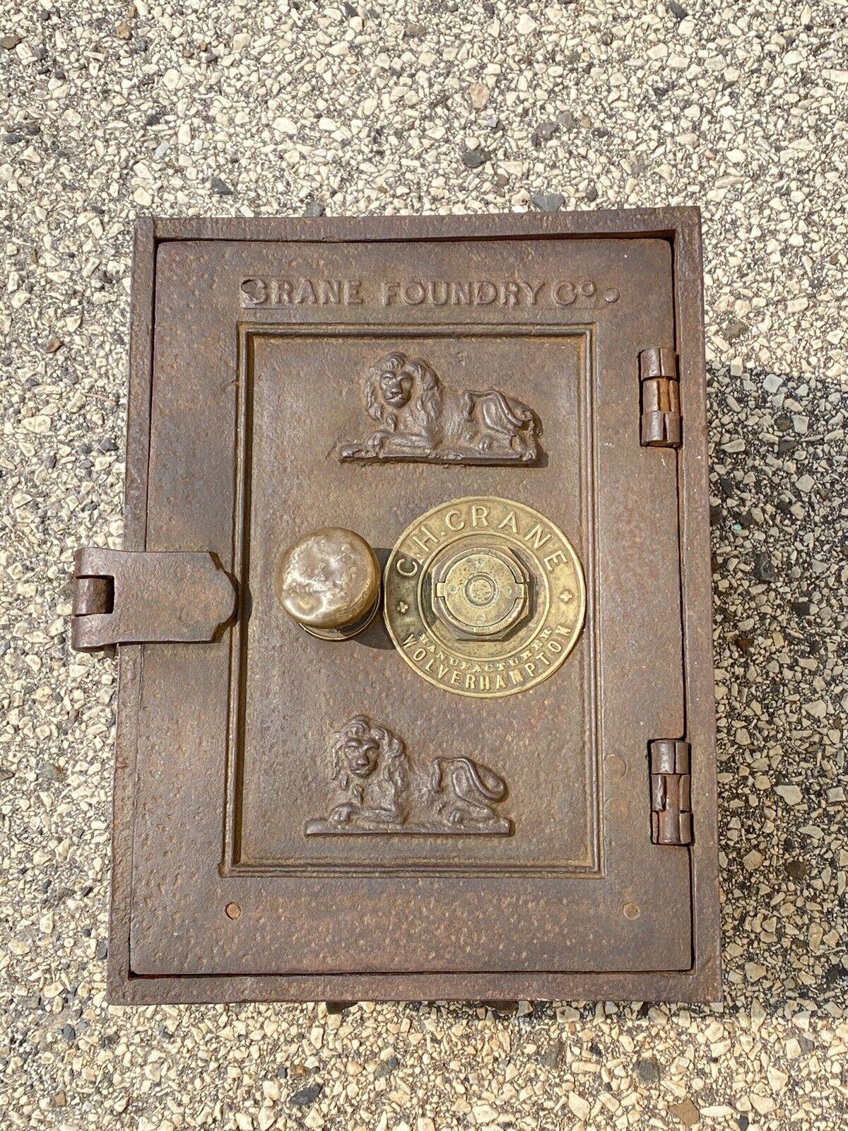Antique Cast Iron Crane Foundry Co C.H. Crane Ship Strongbox Safe with Lions. Item features a very heavy cast iron construction, figural lion relief, brass accents, original makers stamp, no key but unlocked, twin handles, very nice antique item,