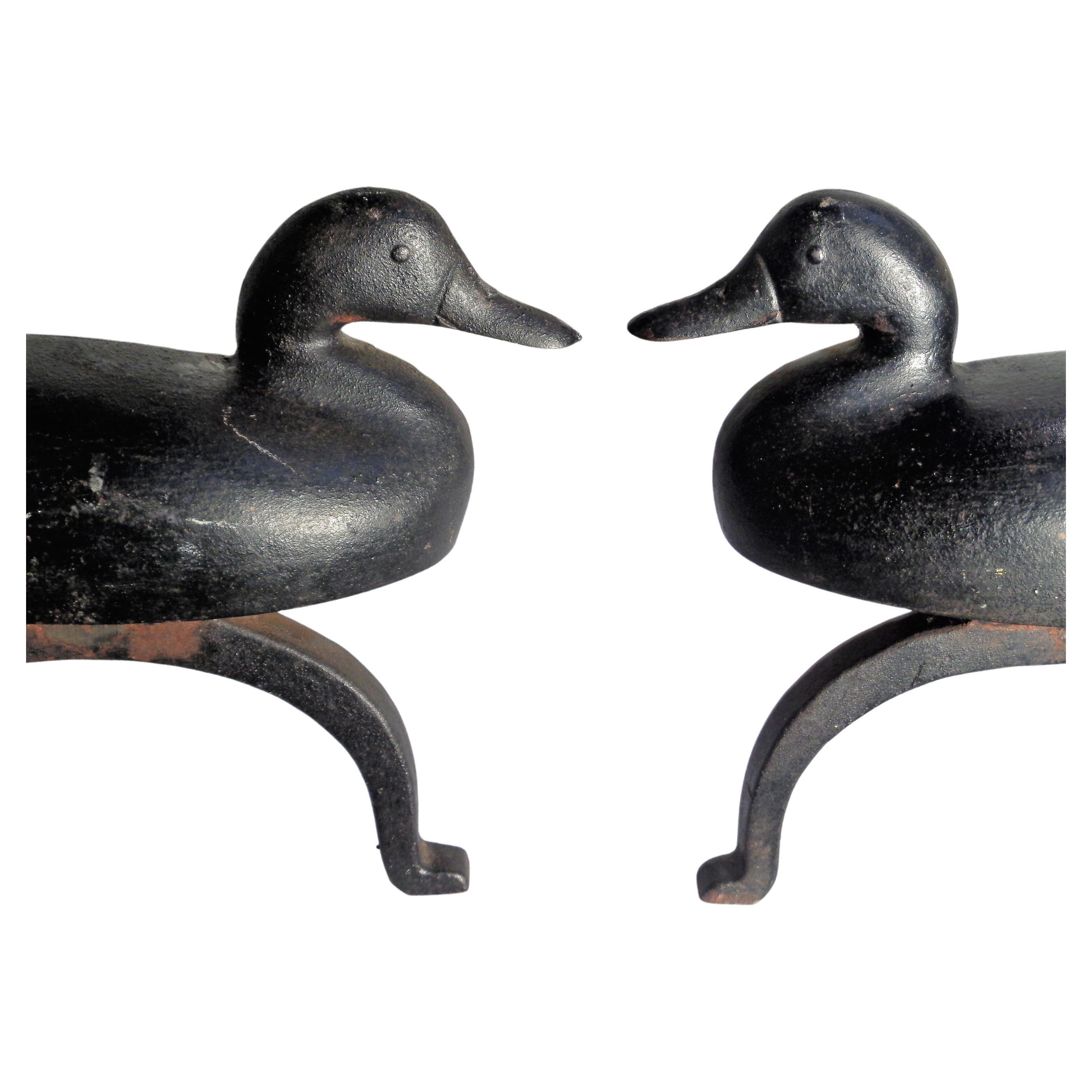 Pair of antique cast iron duck andirons in beautifully aged original old blackened surface. American, circa 1940. Look at all pictures and read condition report in comment section.