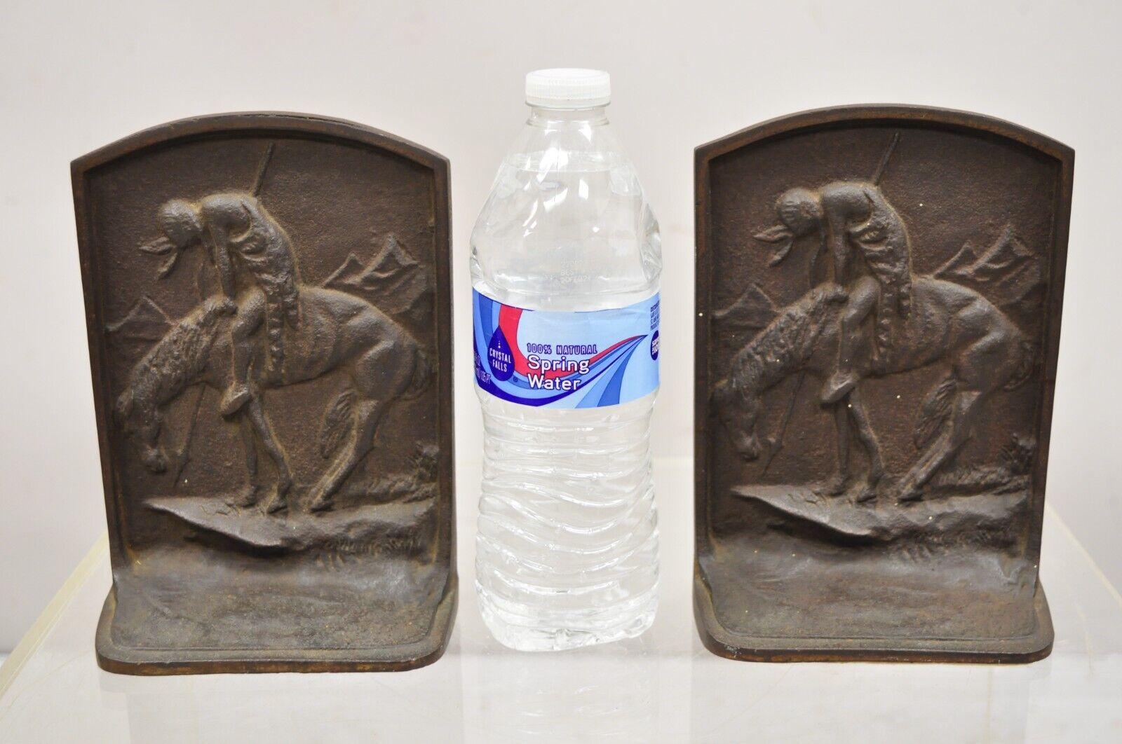 Antique Cast Iron End of Trail Indian Native American Figural Bookends. Circa Early to Mid 20th Century. Measurements: 7