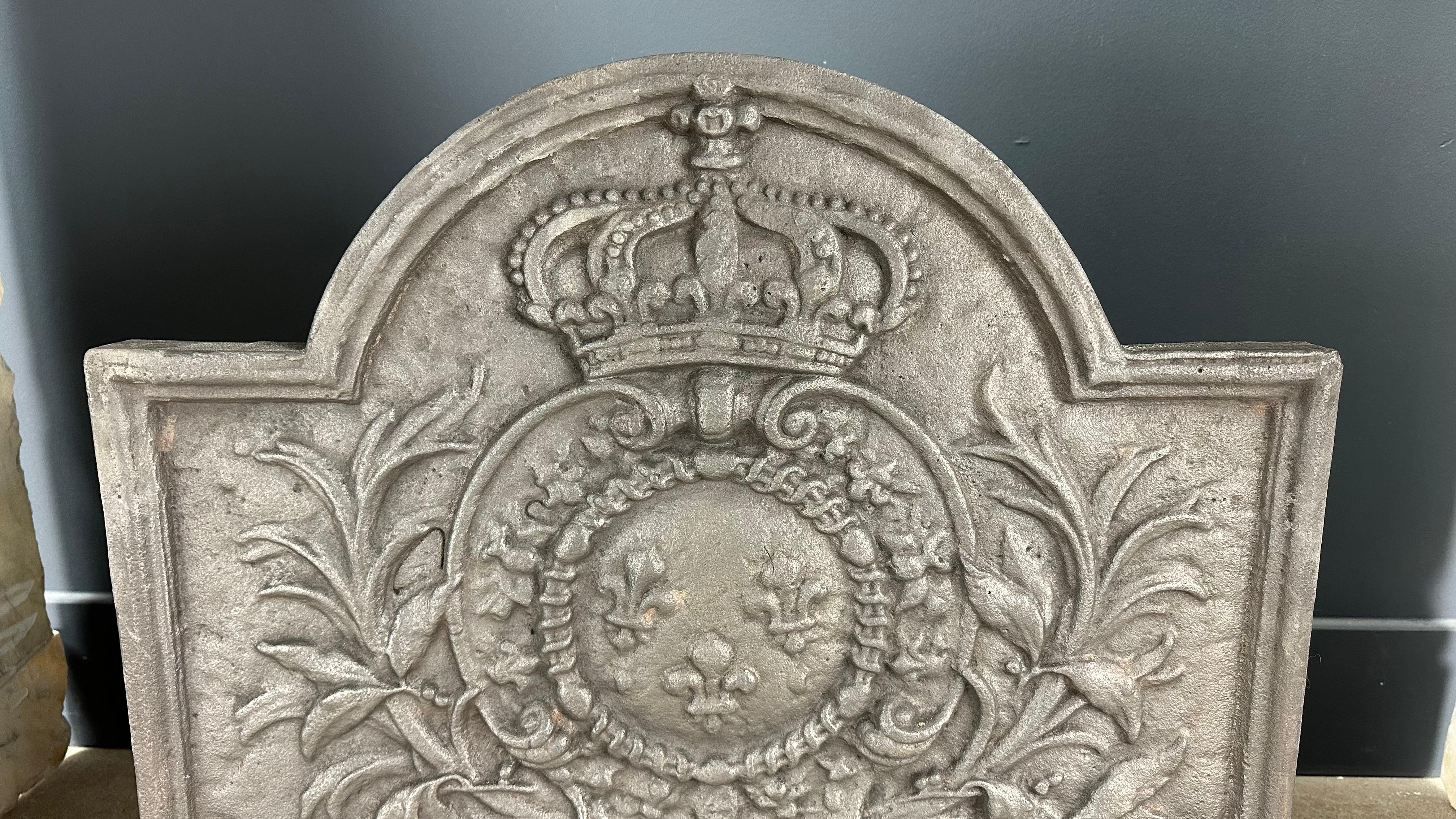 Français Plaque de cheminée en fonte antique en vente