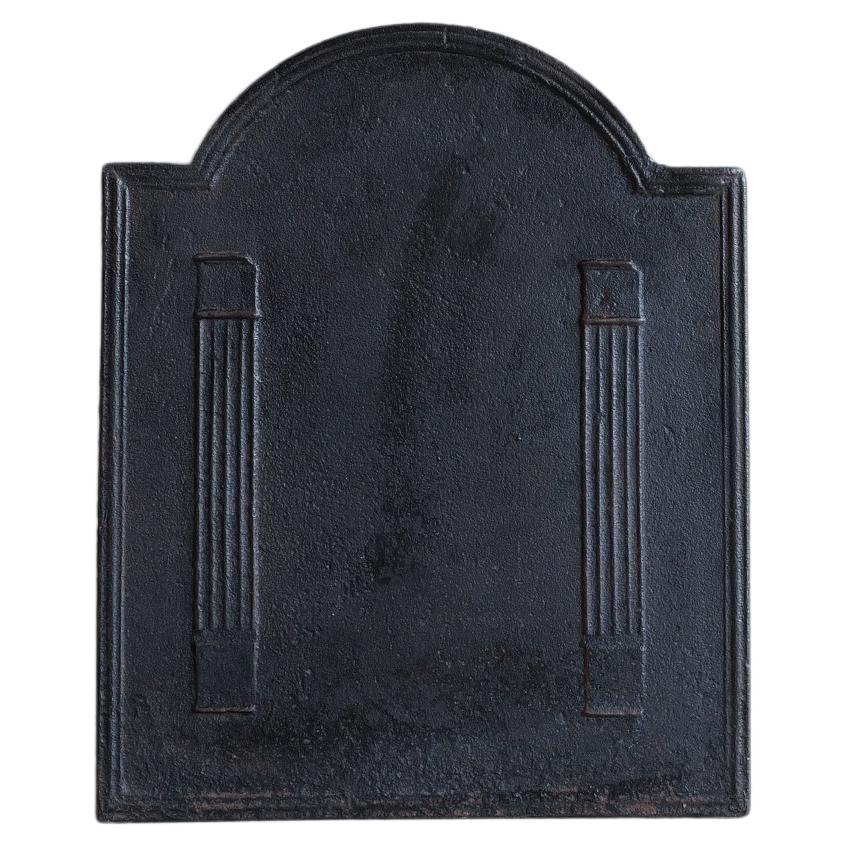 Plaque de cheminée en fonte antique