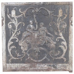 Plaque de cheminée en fonte antique