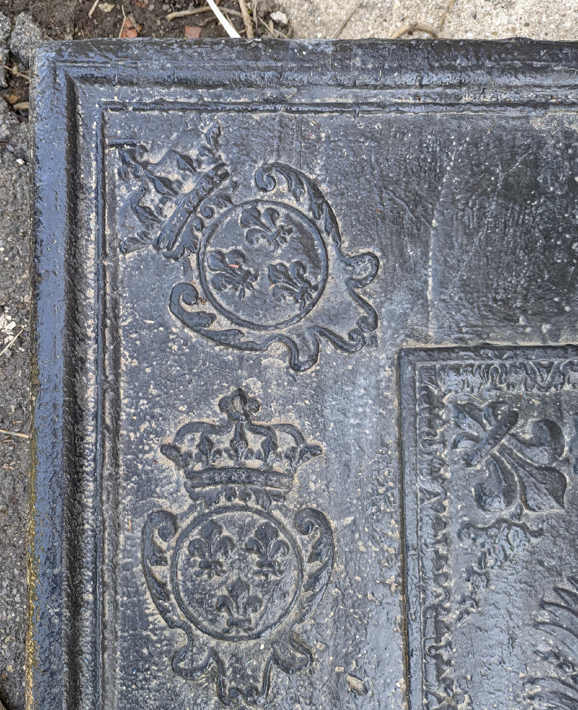 Beveled Antique cast iron fireback with the French coat of arms 18th century For Sale