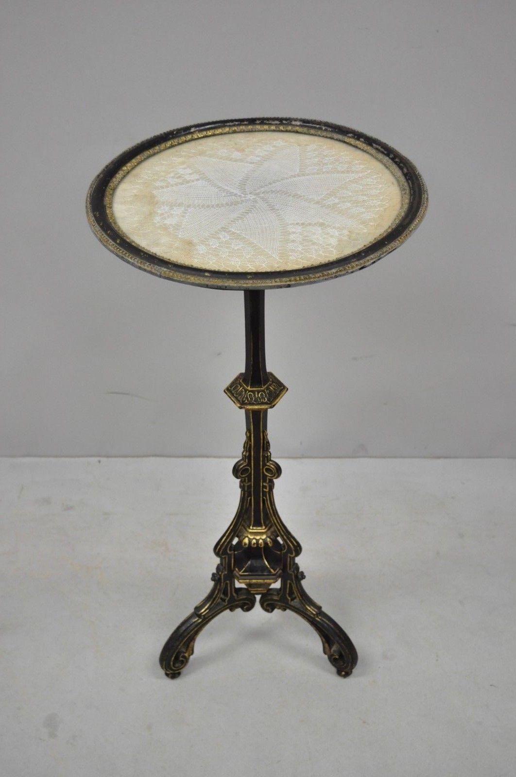 Antique cast iron French Victorian pedestal fern stand table with Lace Doily display top. Item features cast iron frame, French woven doily covered with glass display top, original black and gold finish, very unique antique item, circa 19th century.