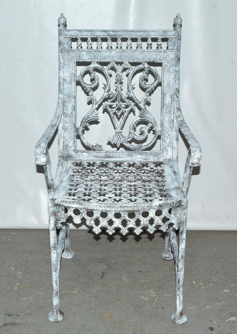 Impressive English cast iron painted garden throne chair with high back and wonderful decorative details that will add interest to any garden. Part of the decoration is missing but still holds it's charm. Please see close-up for details of missing