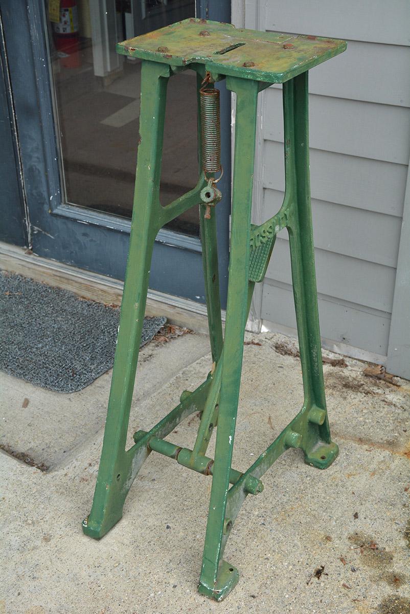 Marked Rossley Industrial cast iron metal stand. Can be used for a sculptors, sculpture stand or plant stand. Spring is not attached. Dimensions: H 36