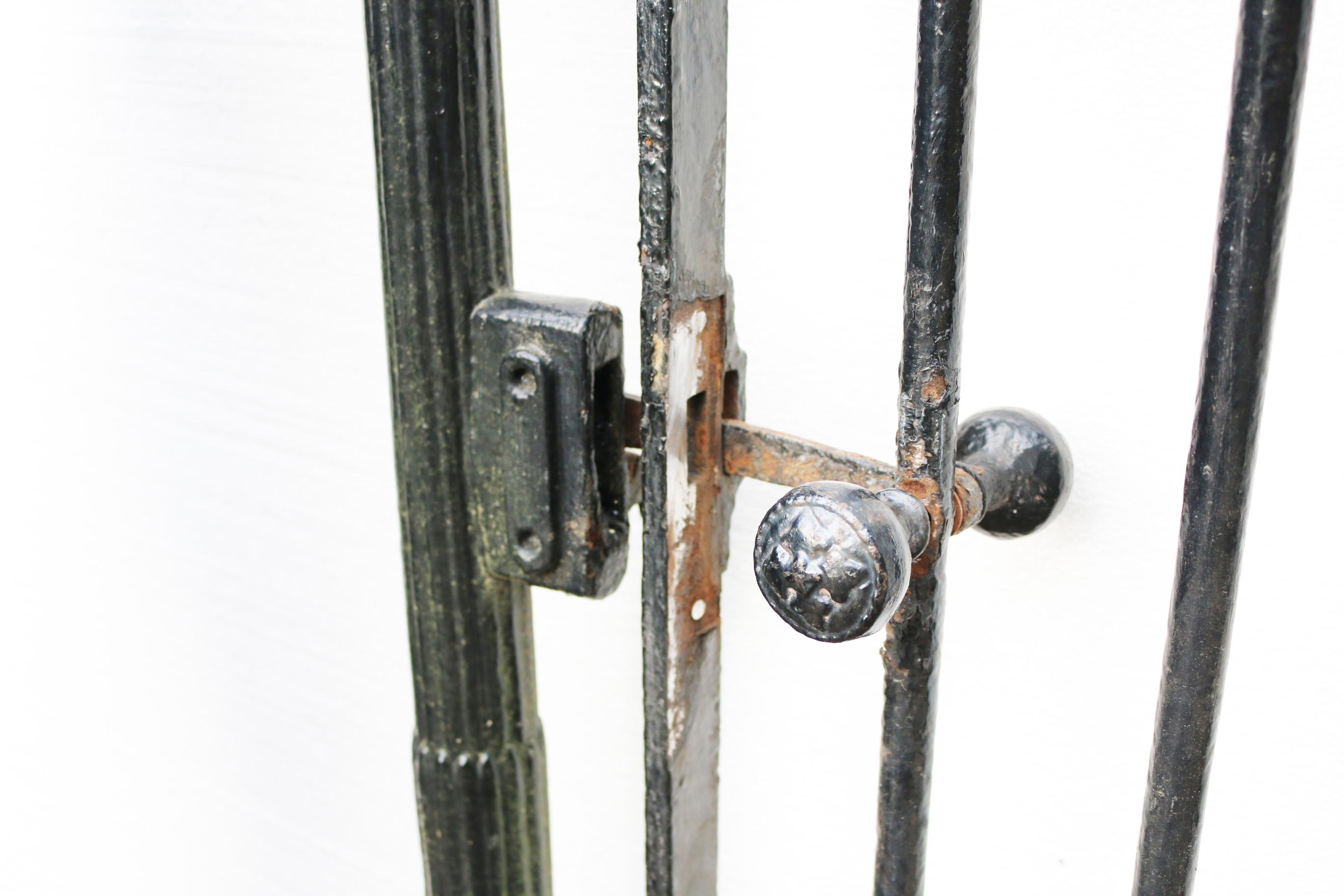 About

An antique Wrought iron gate with cast iron posts, dating to the 1880s. 

Condition report:

Surface rust in areas, excellent structural condition. Old black paint, flaking in places. Top hinge present and working. We have the bottom