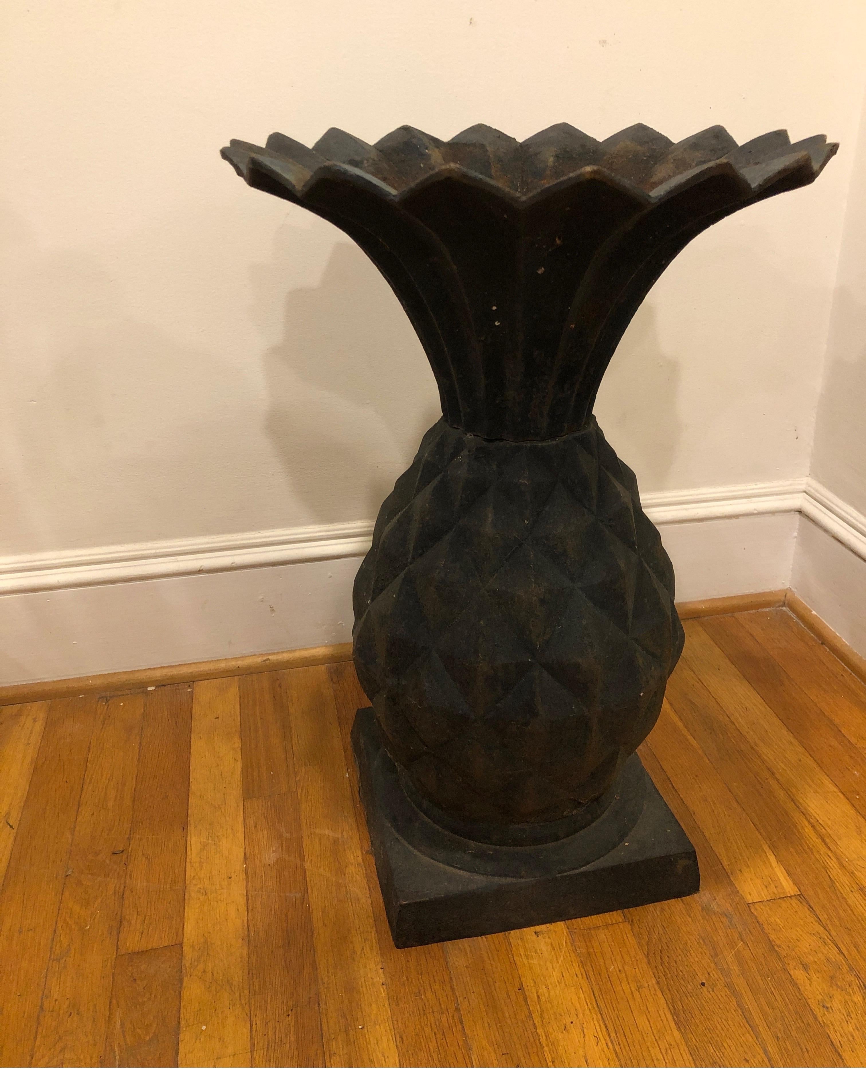 Large solid cast iron planter. Could also be used in a fountain. 
Dark bronze/black finish with natural patina due to age. 

 