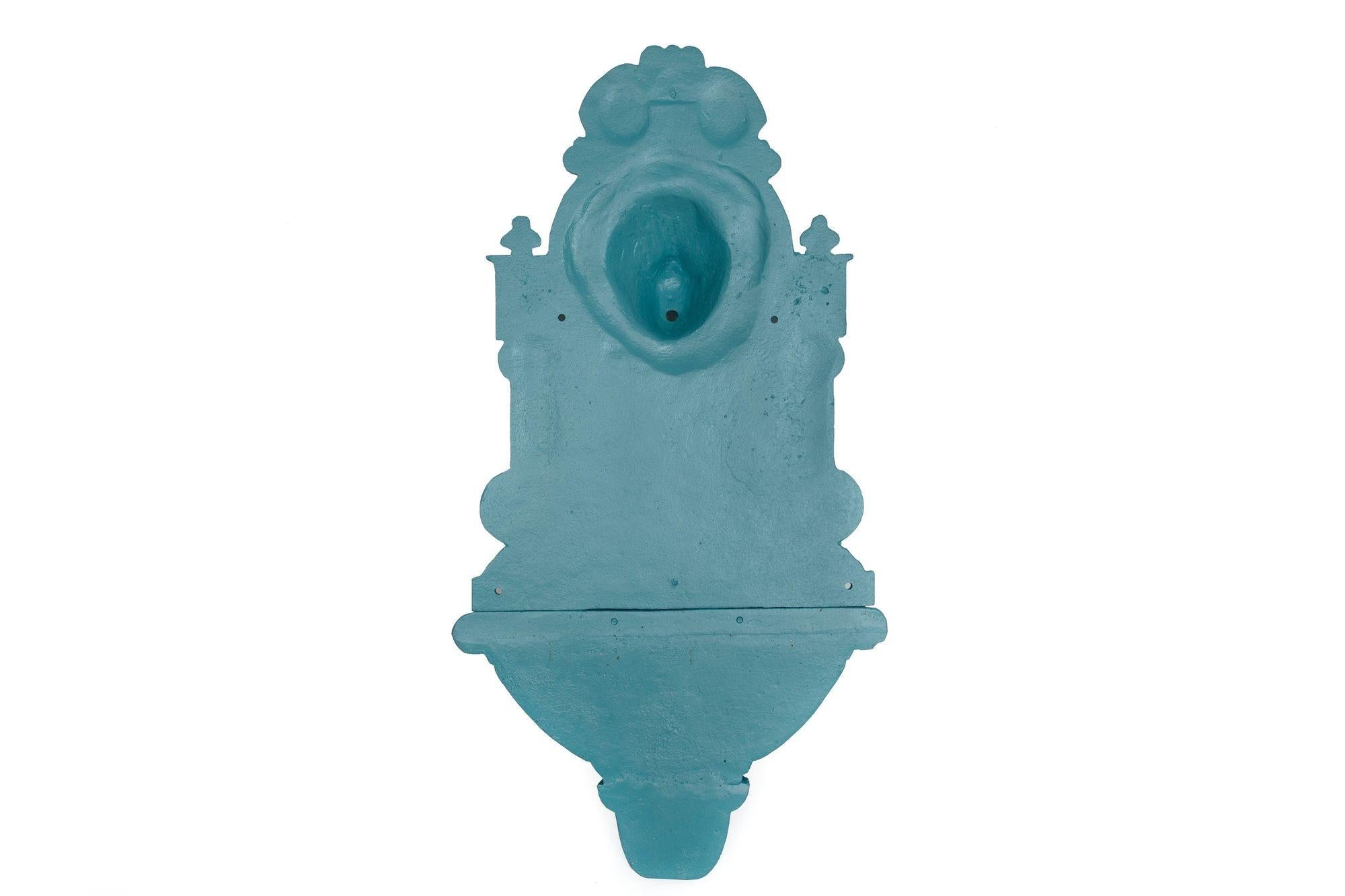 English Antique Cast Iron Wall-Mounted Teal Painted Garden Fountain with Lion Mask For Sale