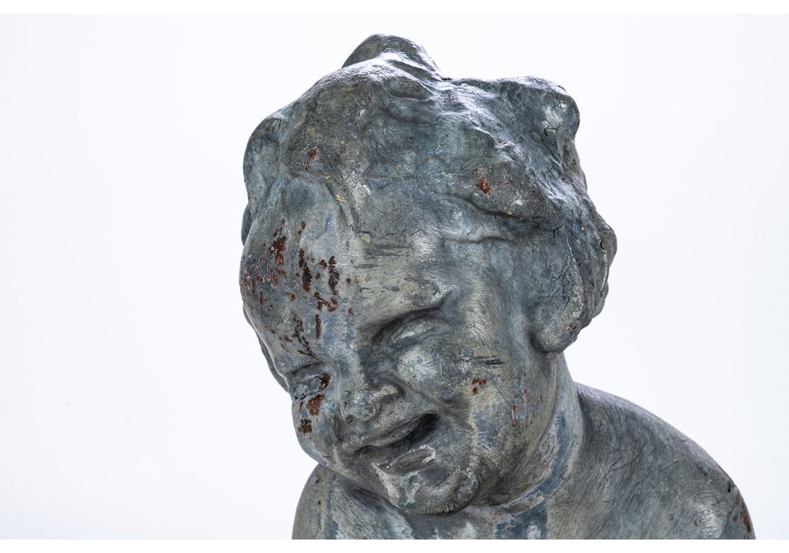 Antigua figura de jardín de plomo fundido de un putto Renacimiento neoclásico en venta