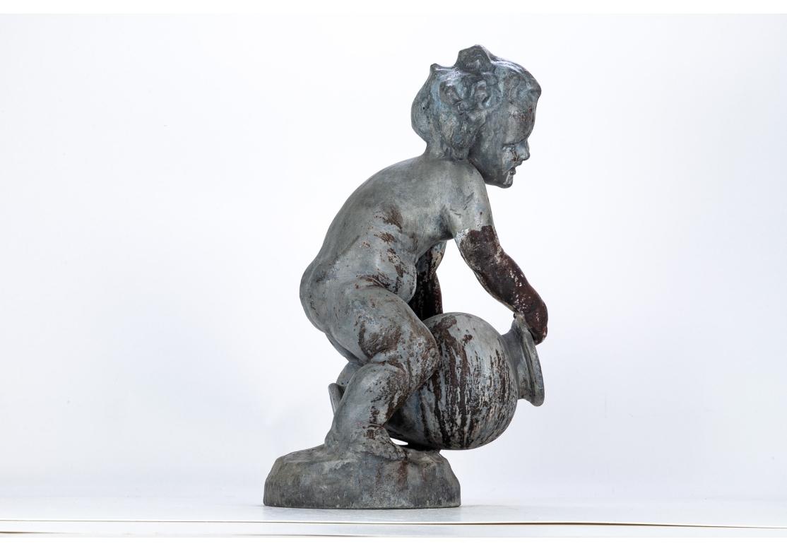 Antigua figura de jardín de plomo fundido de un putto en Desgastado estado para la venta en Bridgeport, CT
