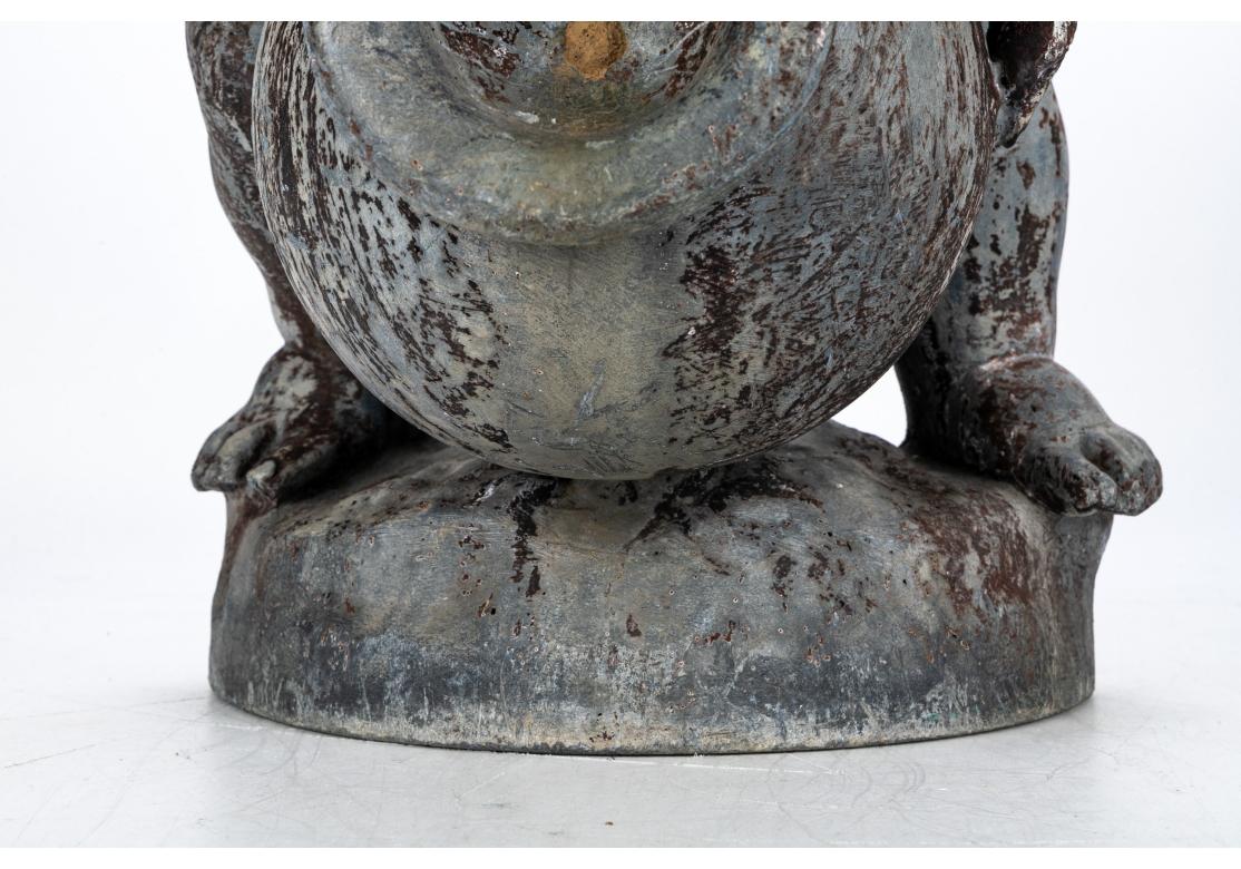 Antigua figura de jardín de plomo fundido de un putto en venta 1