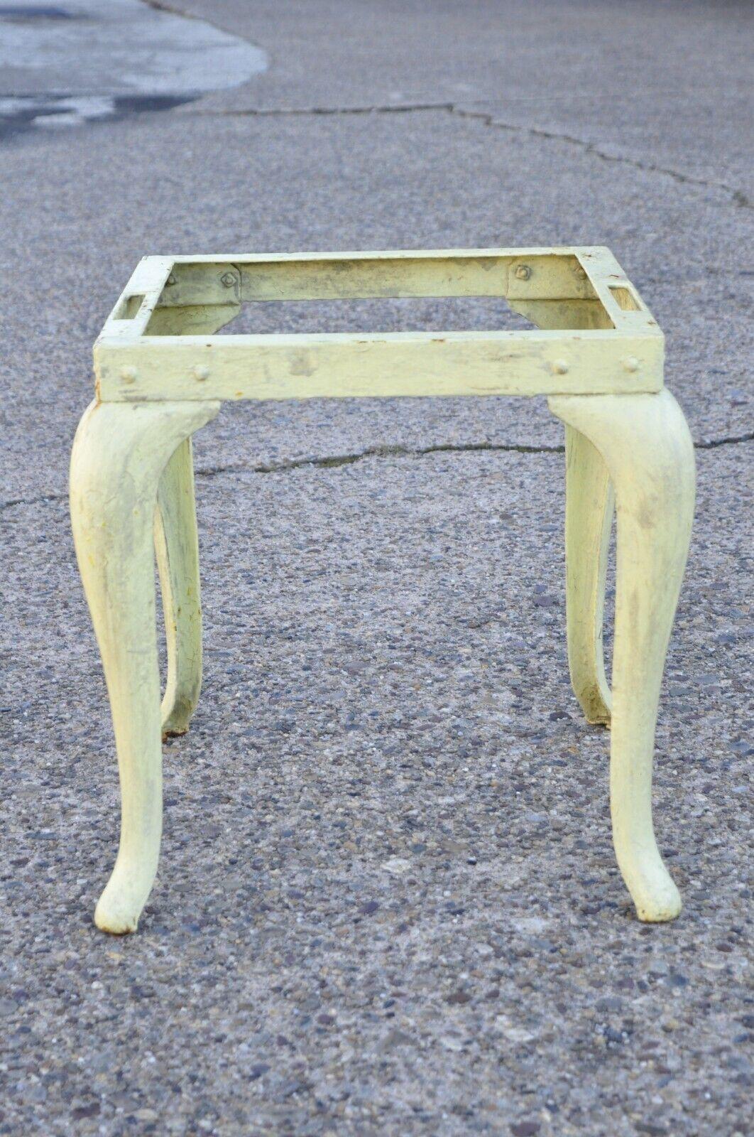 Antique Cast Metal Art Deco Cabriole Leg Yellow Side End Table. Item features a cast metal frame, yellow distress painted finish, cabriole legs, quality American craftsmanship. Circa Early 20th Century.
Measurements: 
22