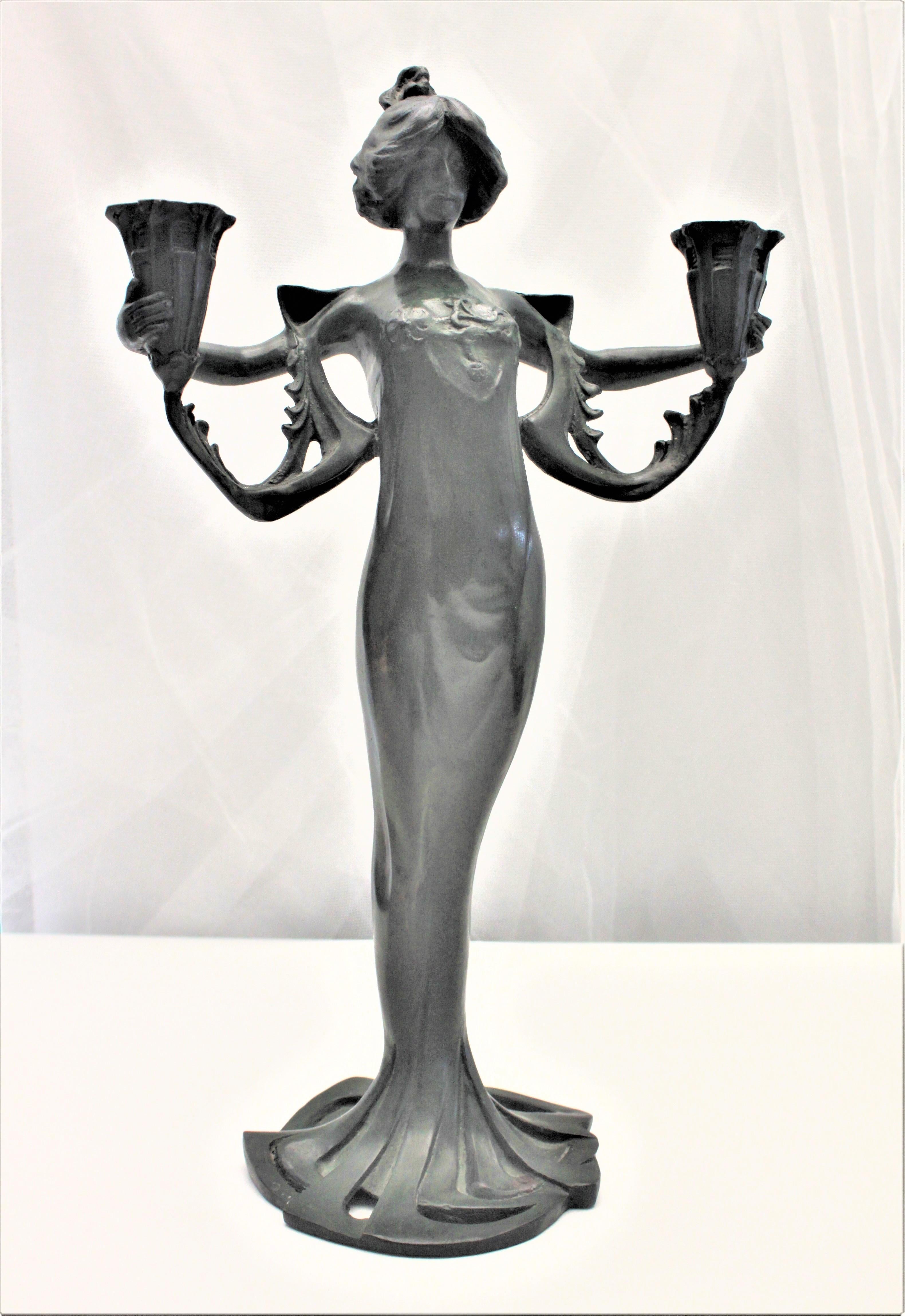 woman candle holder
