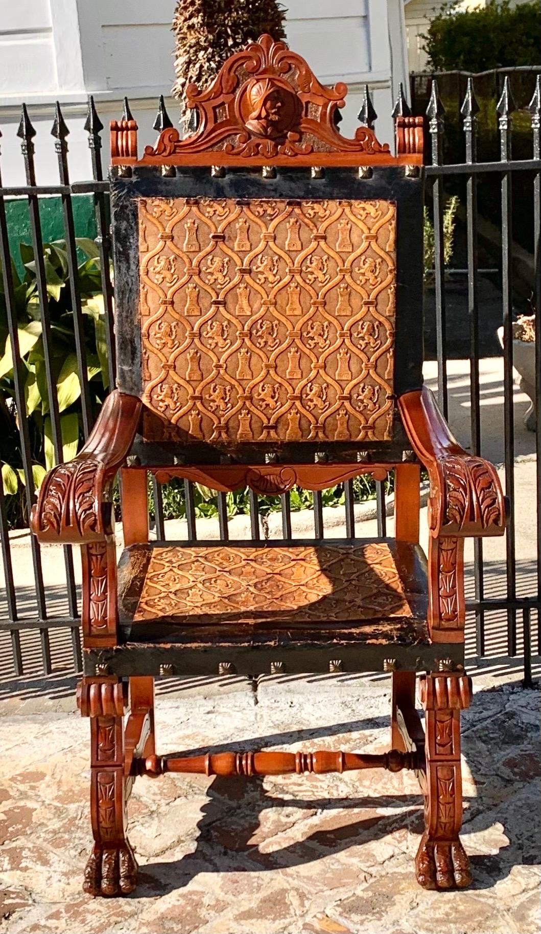 Spanish Antique Castilian Carved Mahogany & Embossed Leather Armchair For Sale