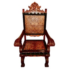 Antiker kastilischer geschnitzter Mahagoni & geprägter Leder Sessel