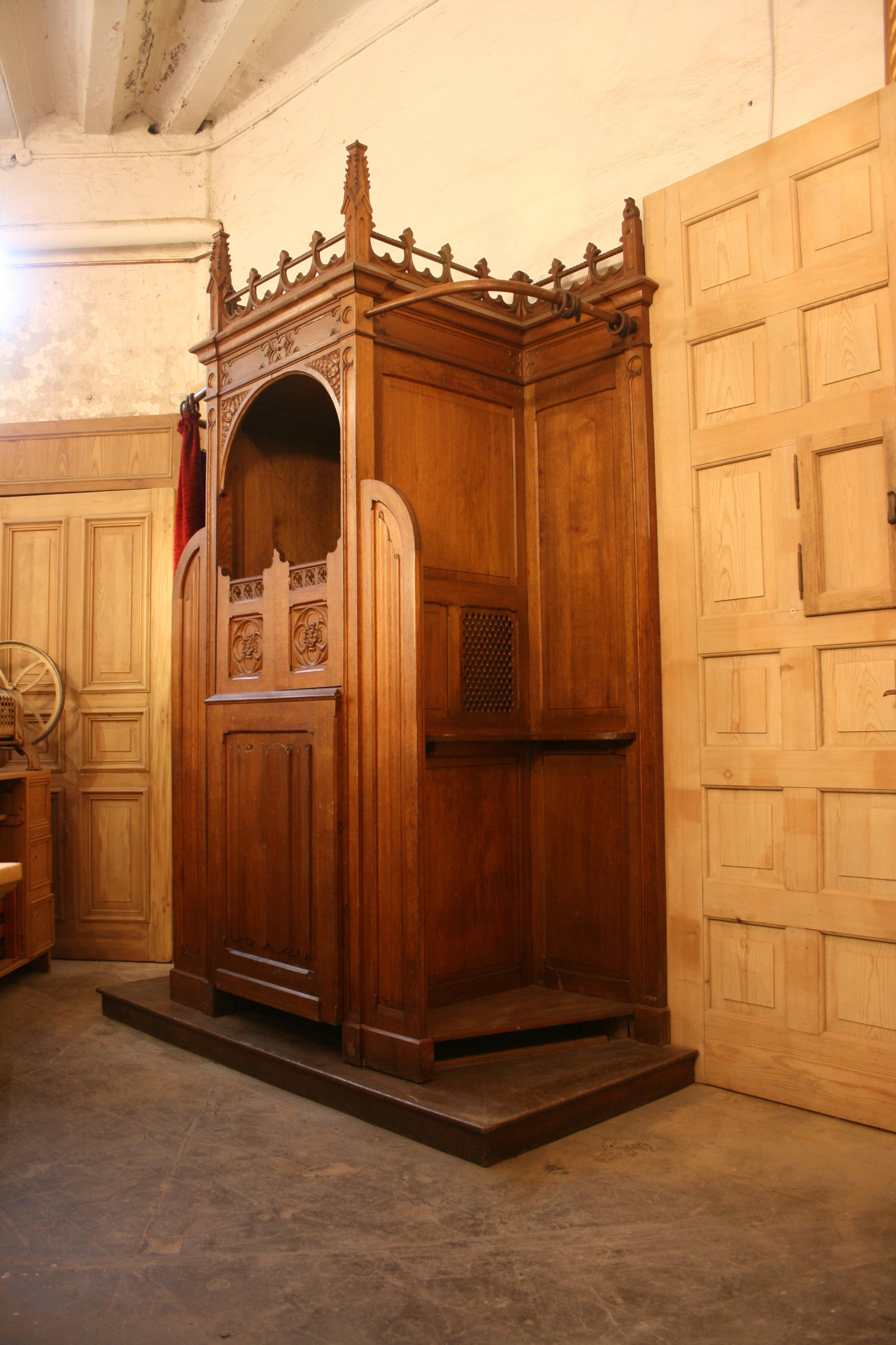 Original antique gothic style catholic confessional from Liège in Belgium. Handmade from solid oak, circa end of the 19th century.


Dimensions: 280 cm high, 202 cm wide, 88 cm deep.