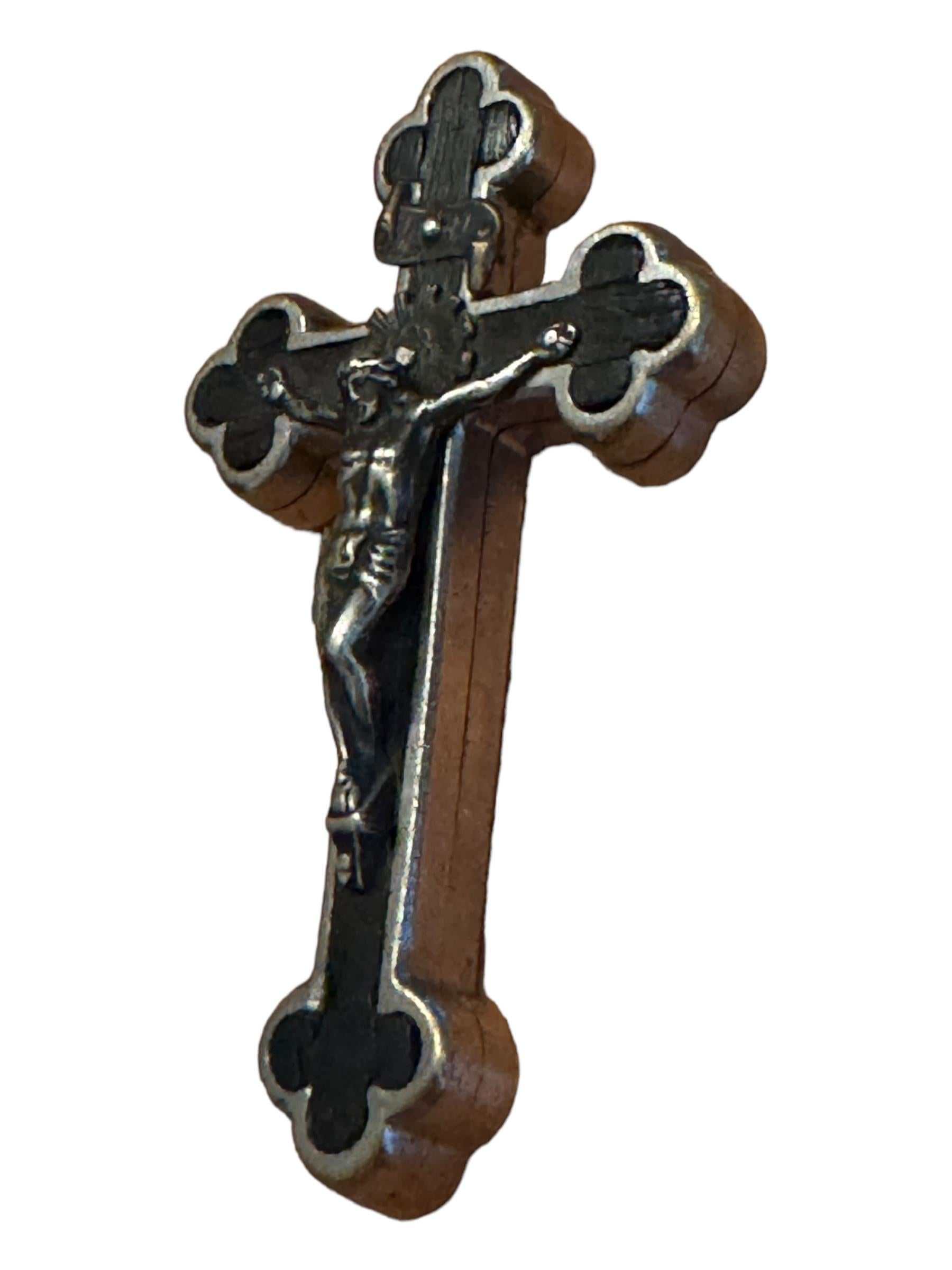 This antique reliquary contains 10 relics of saints with paper scrolls and red velvet. It is handcrafted from metal.
This is a 3rd class relic. For better understanding, relics are divided into three classifications. A first-class relic is a body
