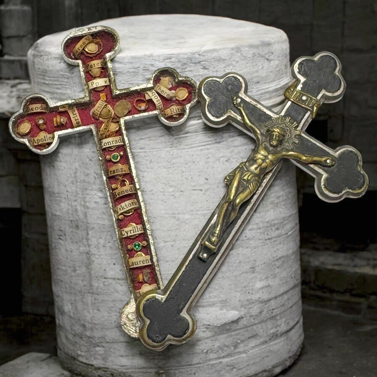This antique reliquary contains 18 relics of saints with paper scrolls and red velvet. It is handcrafted from metal.
This is a 3rd class relic. For better understanding, relics are divided into three classifications. A first-class relic is a body