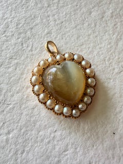 Antique cats eye and pearl necklace pendant in 14kt yellow gold circa early 1900