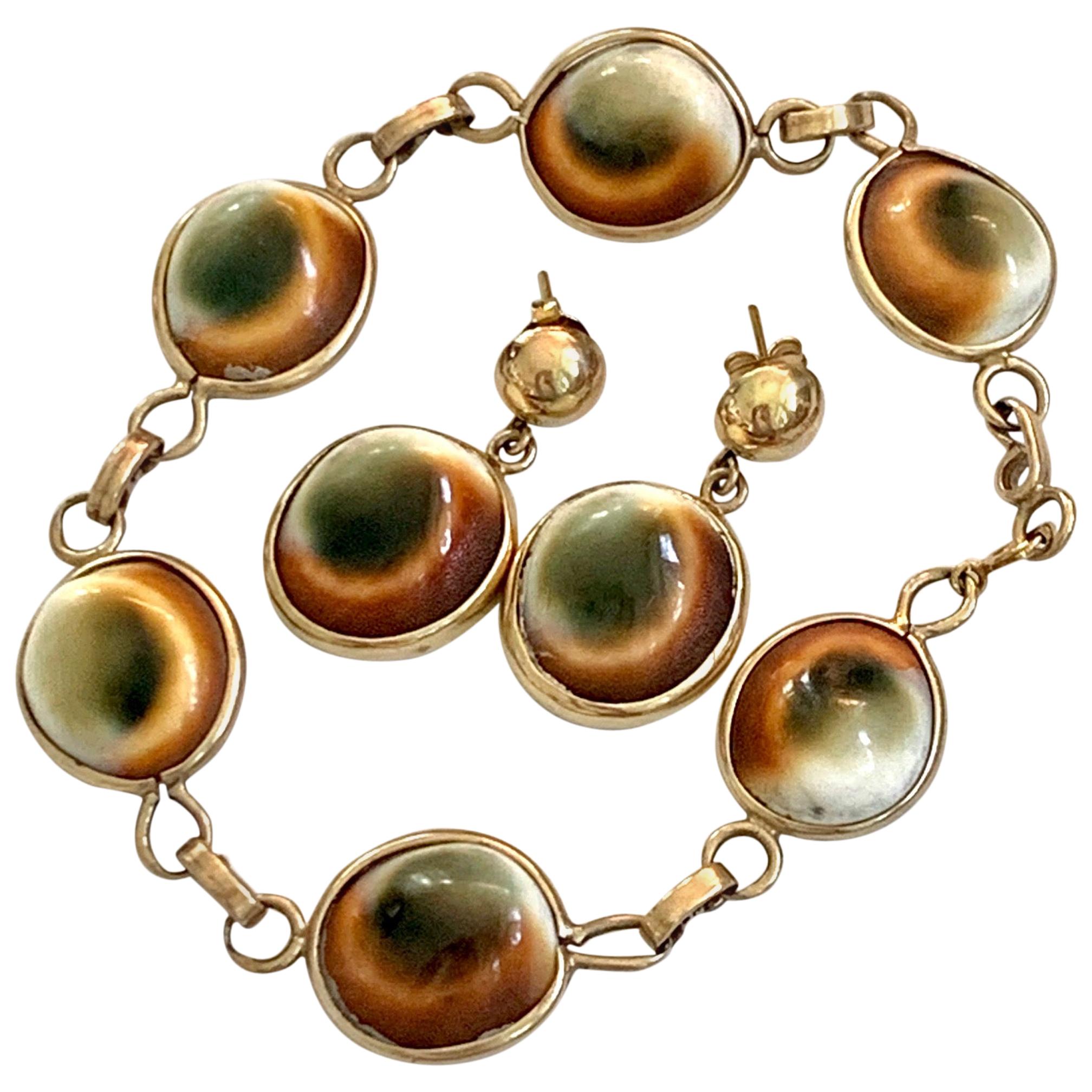 Antique Cat's Eye Operculum Snail 14 Karat Yellow Gold Bracelet and Earrings For Sale
