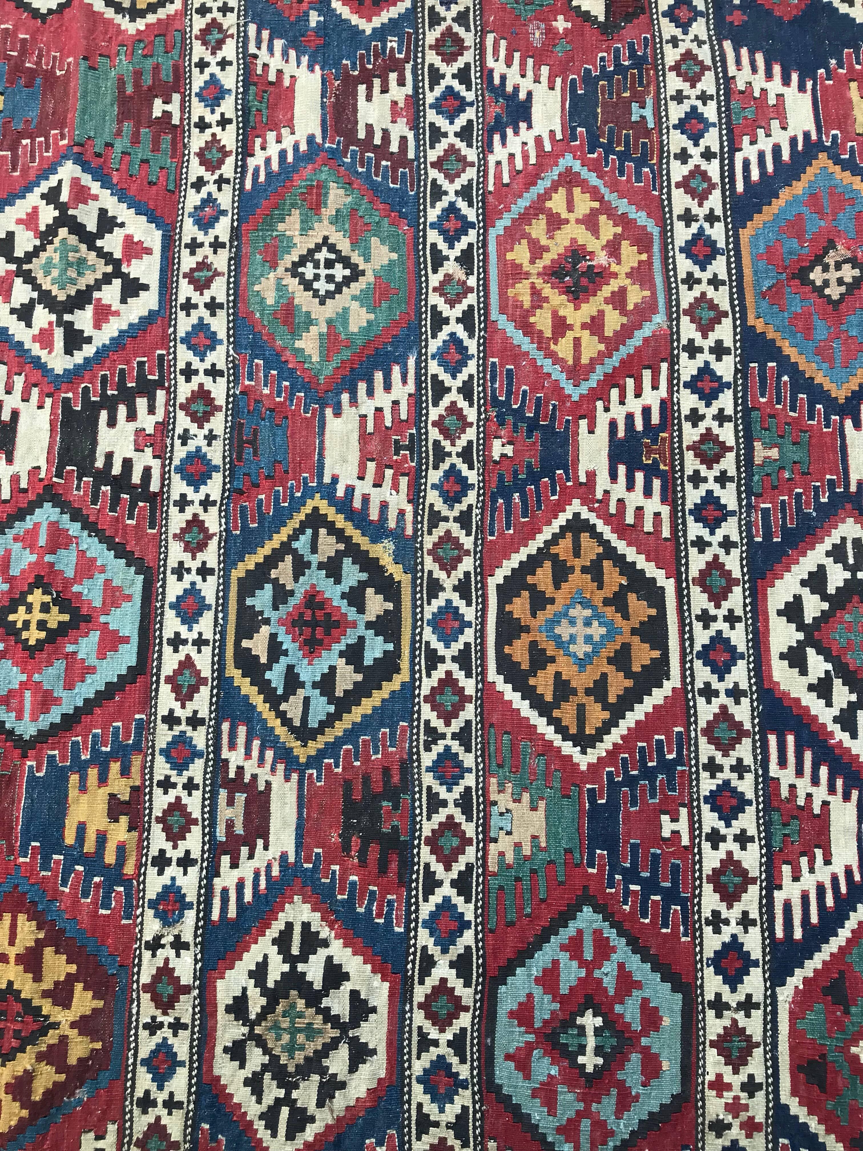 Very beautiful antique Kilim from Caucasus with nice natural colors with blue green, orange and red, and geometrical tribal design. A collectible piece, entirely handwoven with wool on wool foundation.

✨✨✨
