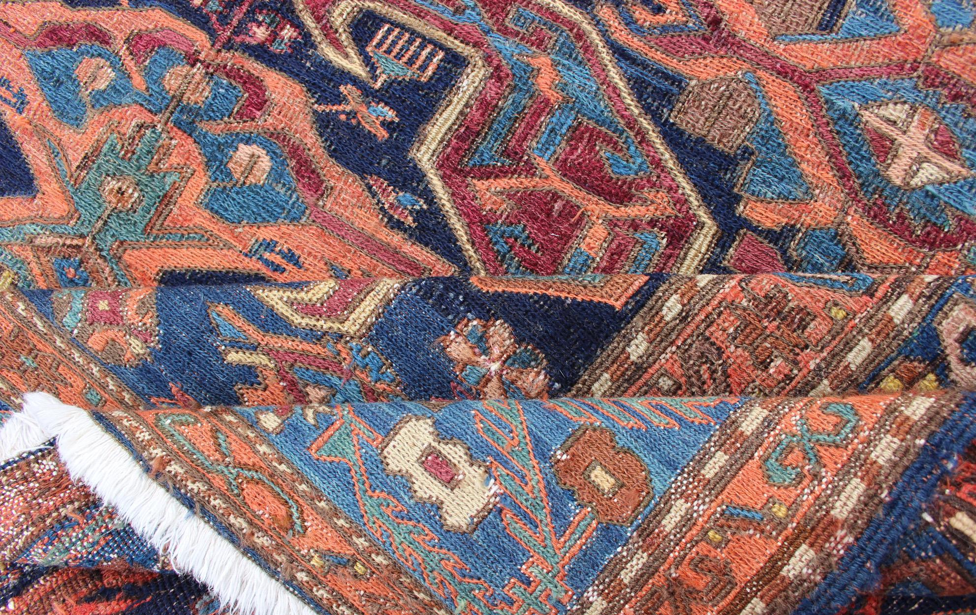 Persian Antique Caucasian 19th Century Sumac Rug in Varying Colors of Orange and Blue For Sale
