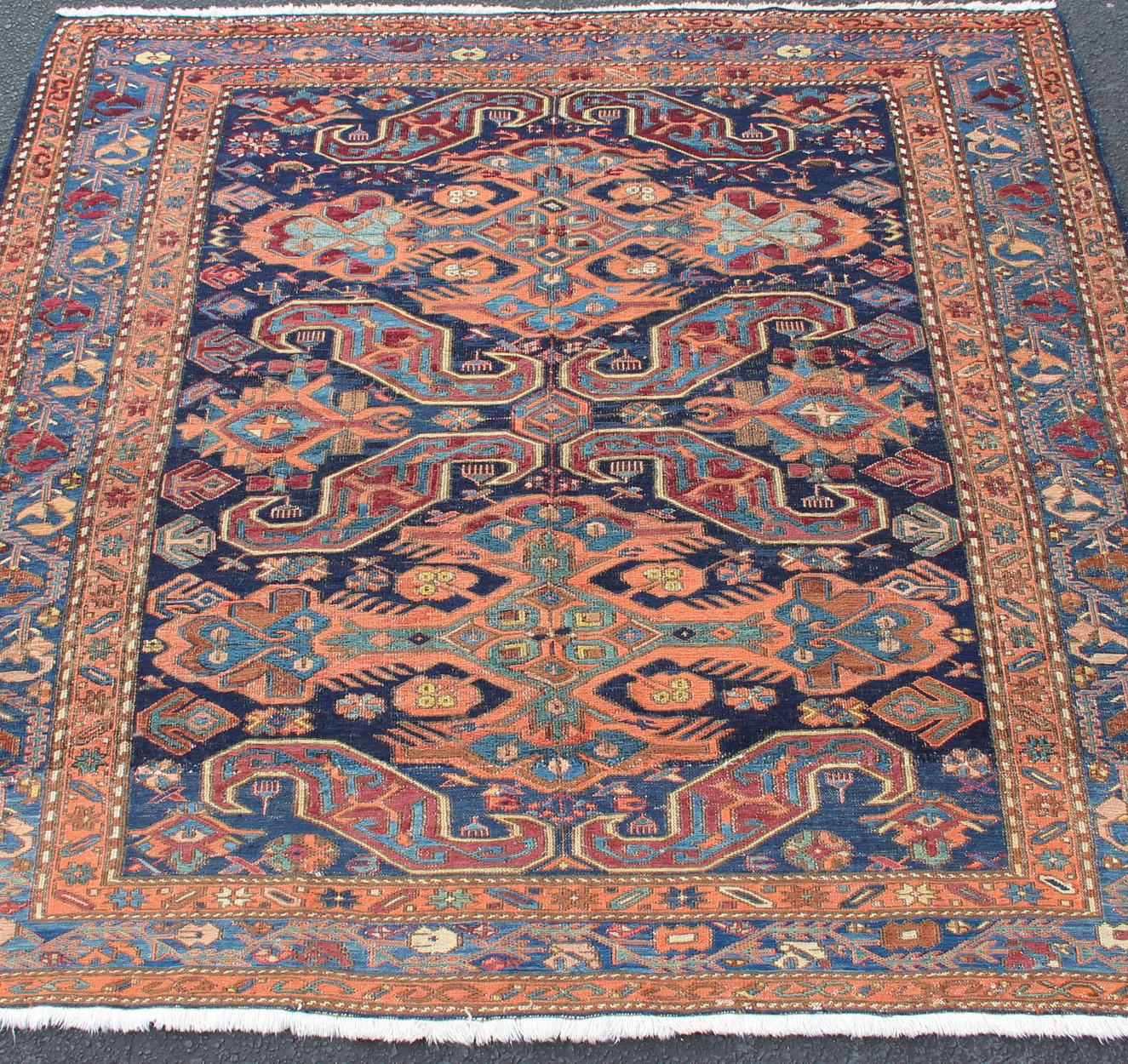 Antique Caucasian 19th Century Sumac Rug in Varying Colors of Orange and Blue In Good Condition For Sale In Atlanta, GA