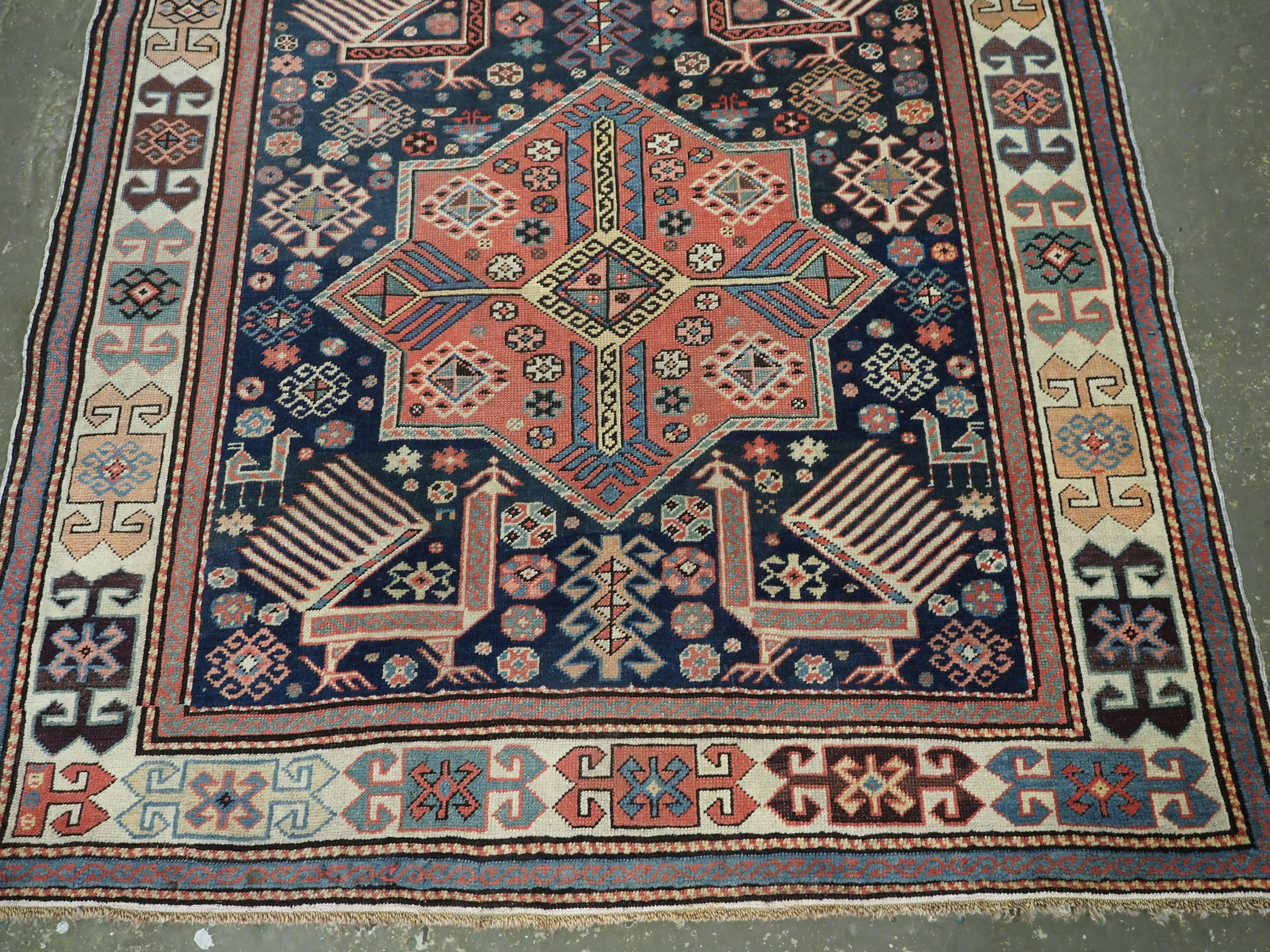 Late 19th Century Antique Caucasian Akstafa long rug with three star medallions, circa 1880. For Sale
