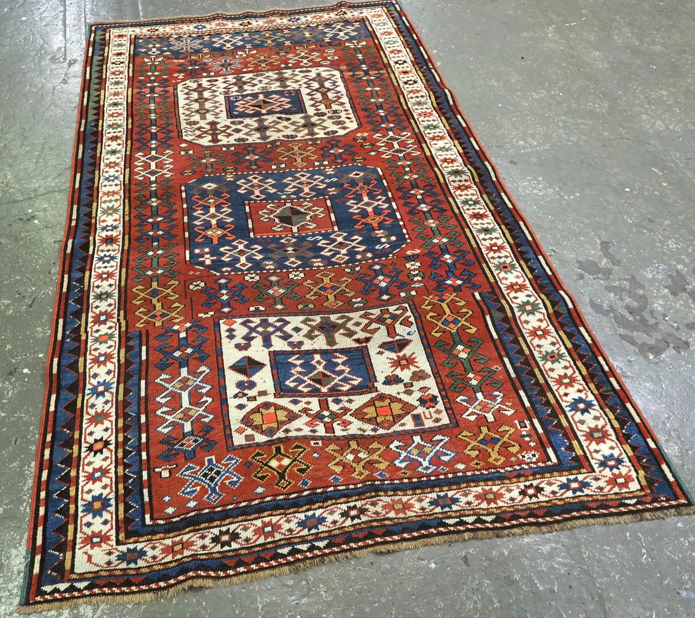 Size: 7ft 0in x 4ft 3in (213 x 129cm).

Antique Caucasian Chajli long rug with triple medallion design.

Circa 1880.

A good example of a Chajli rug, with the traditional three medallion design. This rug has some very unusual design variations; the