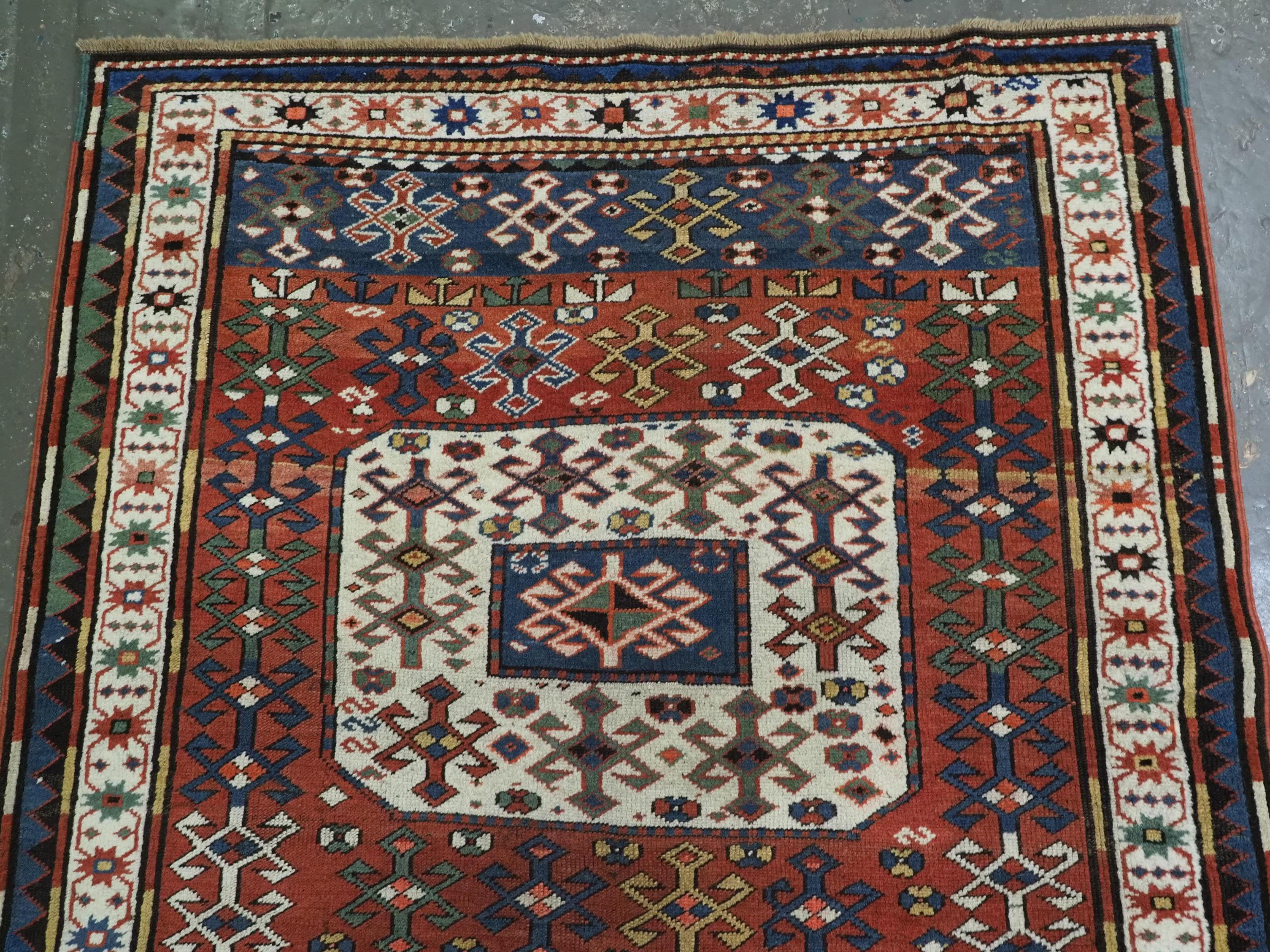 Antique Caucasian Chajli long rug with triple medallion design.  Circa 1880. In Good Condition For Sale In Moreton-In-Marsh, GB