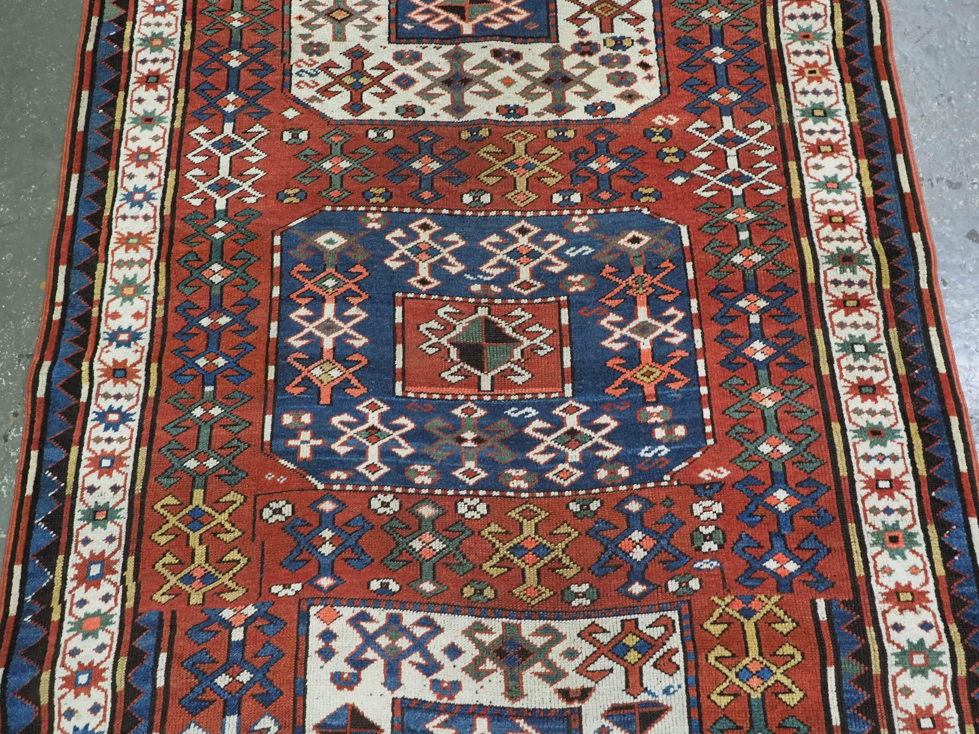 Late 19th Century Antique Caucasian Chajli long rug with triple medallion design.  Circa 1880. For Sale