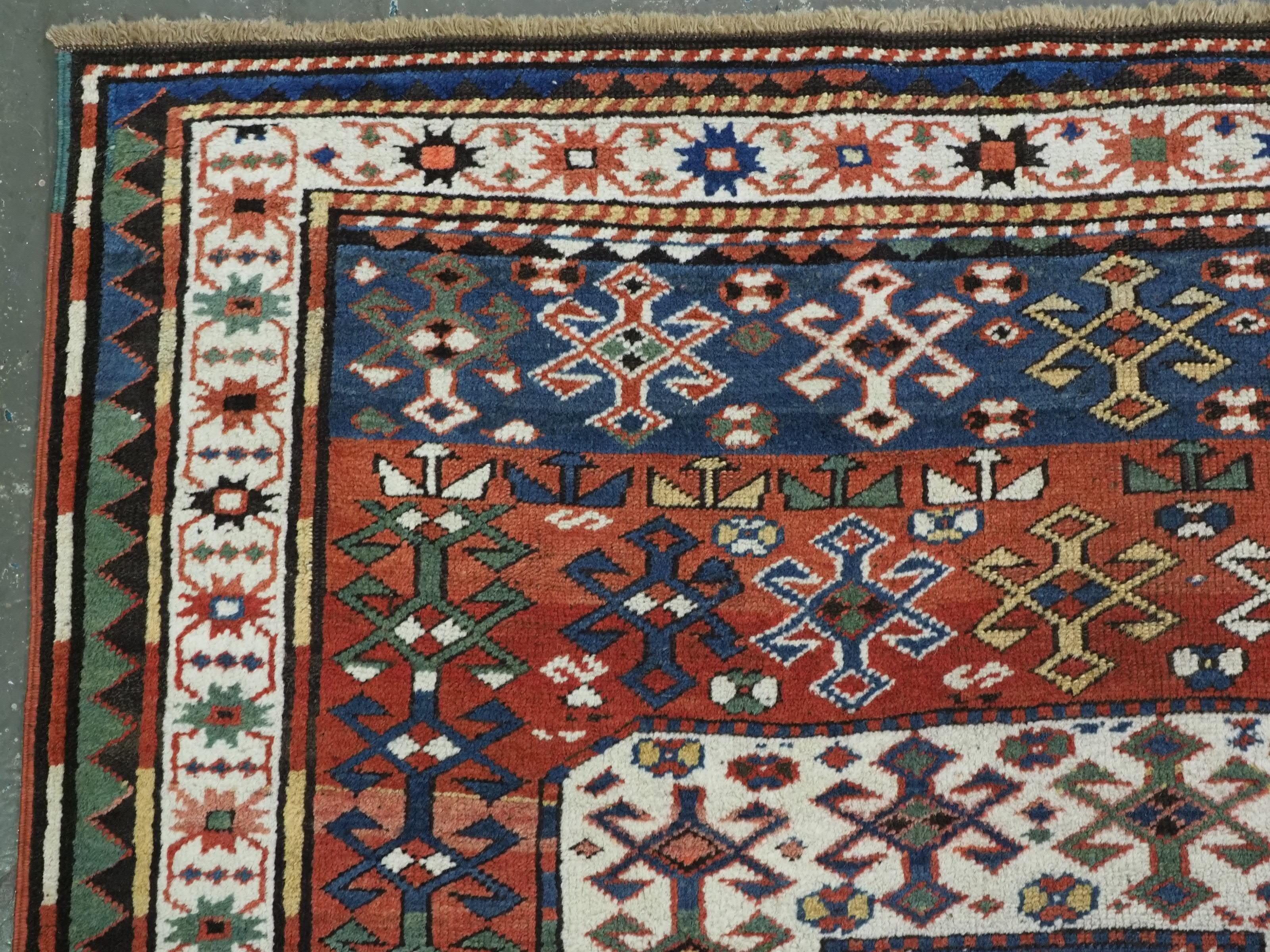 Antique Caucasian Chajli long rug with triple medallion design.  Circa 1880. For Sale 1