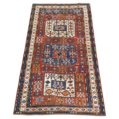 Antique Caucasian Chajli long rug with triple medallion design.  Circa 1880.