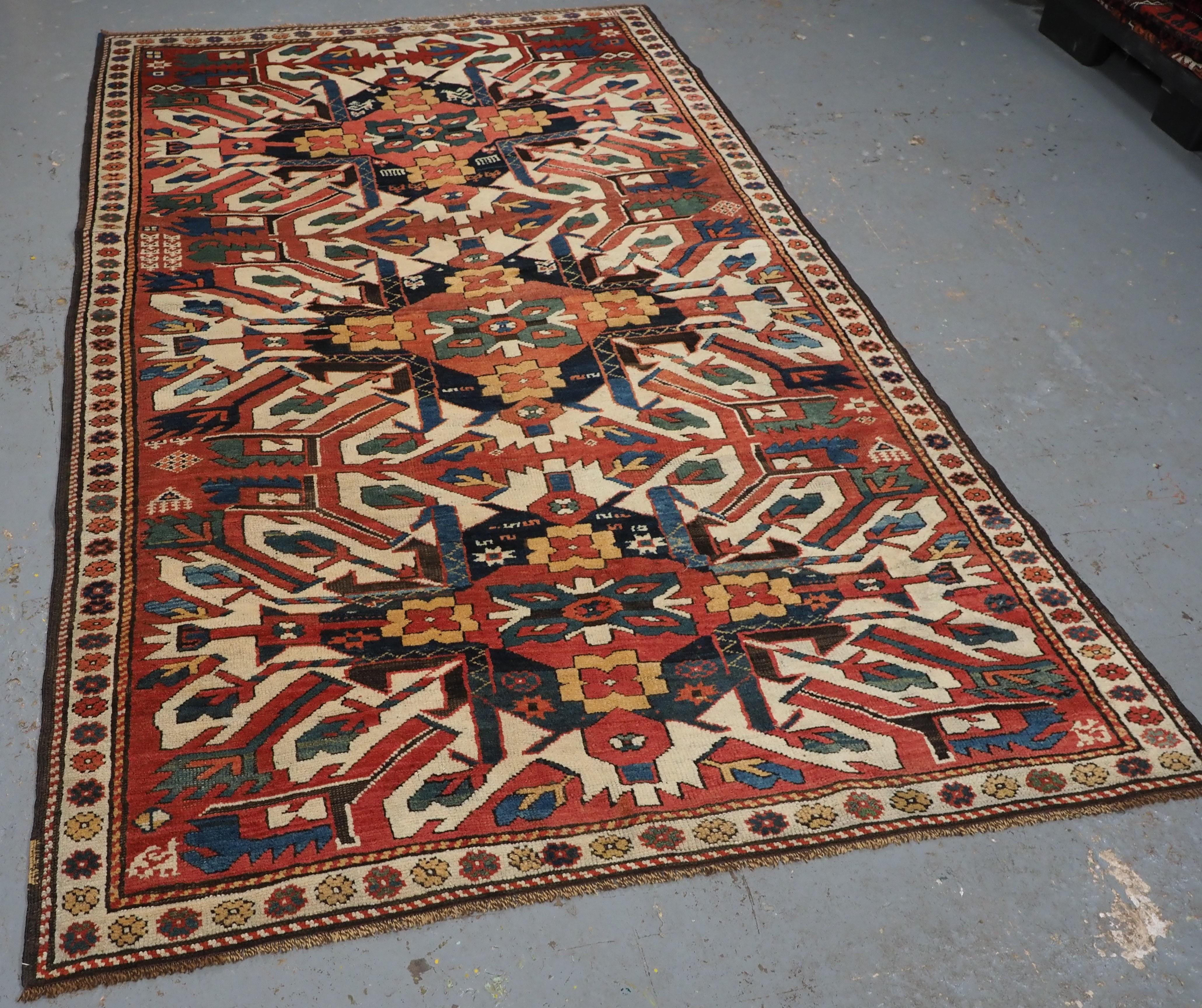 Size: 7ft 7in x 4ft 6in (232 x 138cm)

Antique Caucasian Chelaberd Kazak triple medallion rug.

Circa 1890.

A superb Kazak rug of the sought after and well known Chelaberd design, also known as Eagle (Adler) or Sunburst Kazak rugs. These rugs are