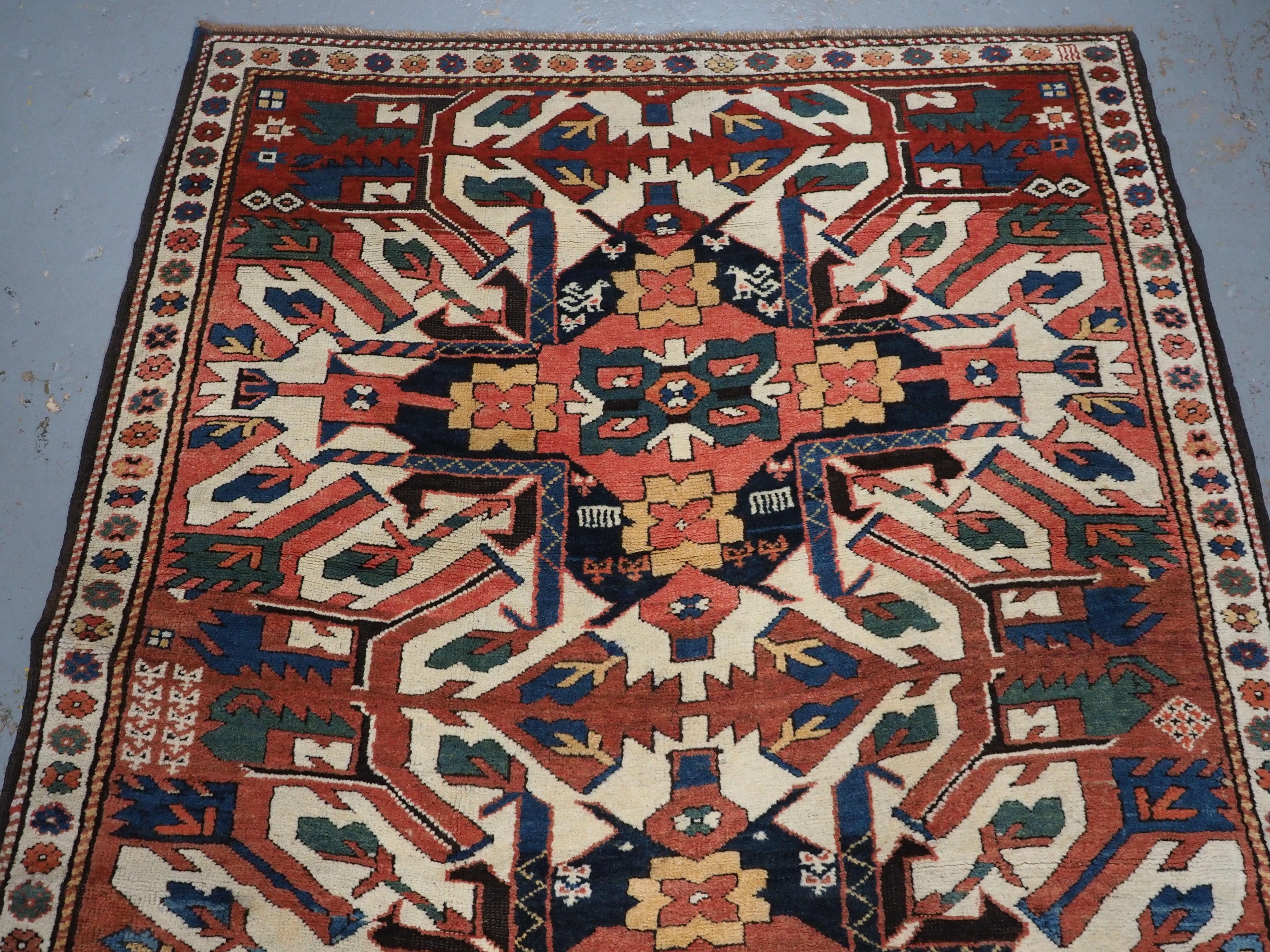 Antique Caucasian Chelaberd Kazak triple medallion rug, circa 1890. In Good Condition For Sale In Moreton-In-Marsh, GB