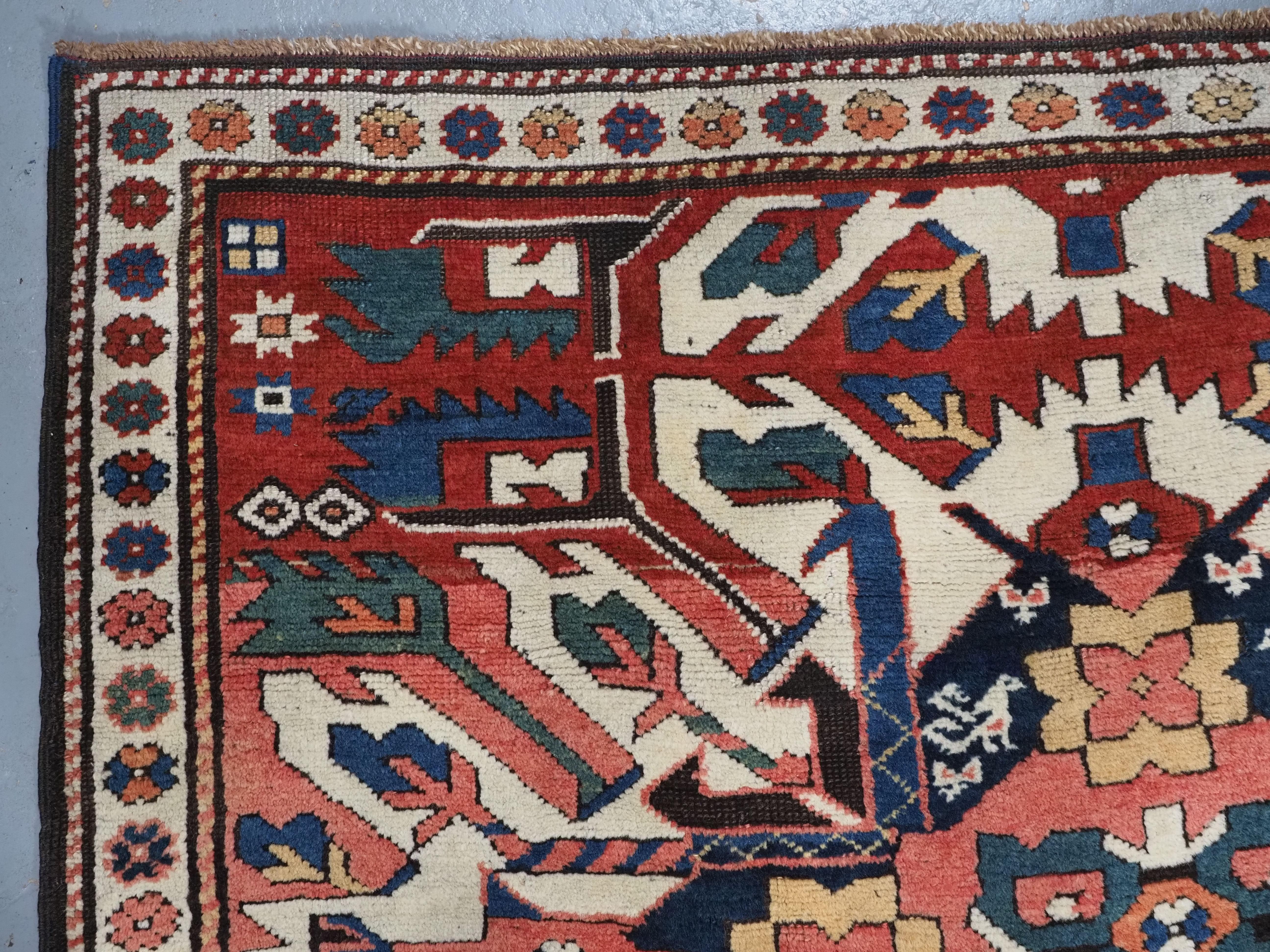 Antique Caucasian Chelaberd Kazak triple medallion rug, circa 1890. For Sale 1
