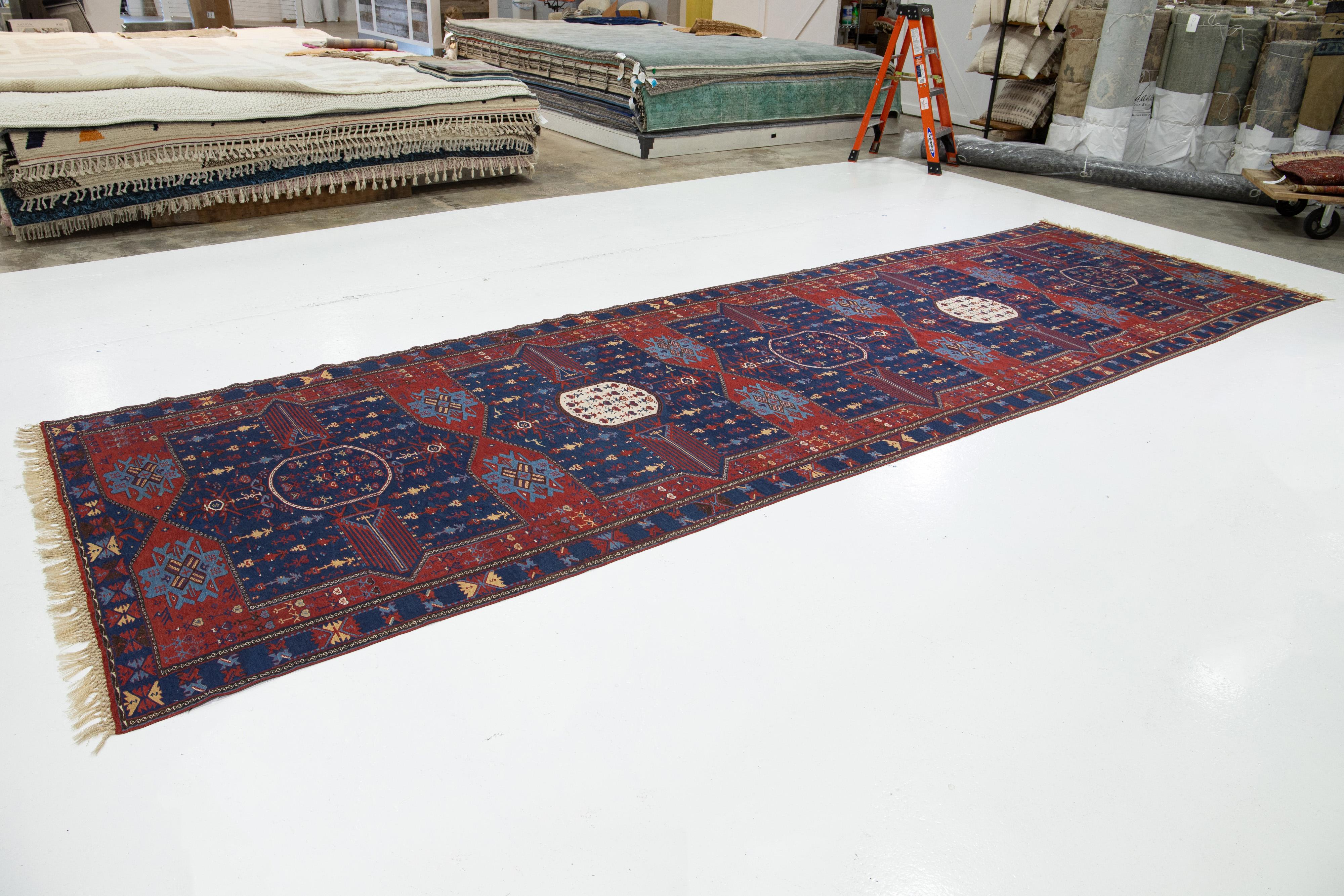 Hand-Knotted Antique Caucasian Dagestan Handmade Wool Runner In Blue Color With Tribal Motif For Sale
