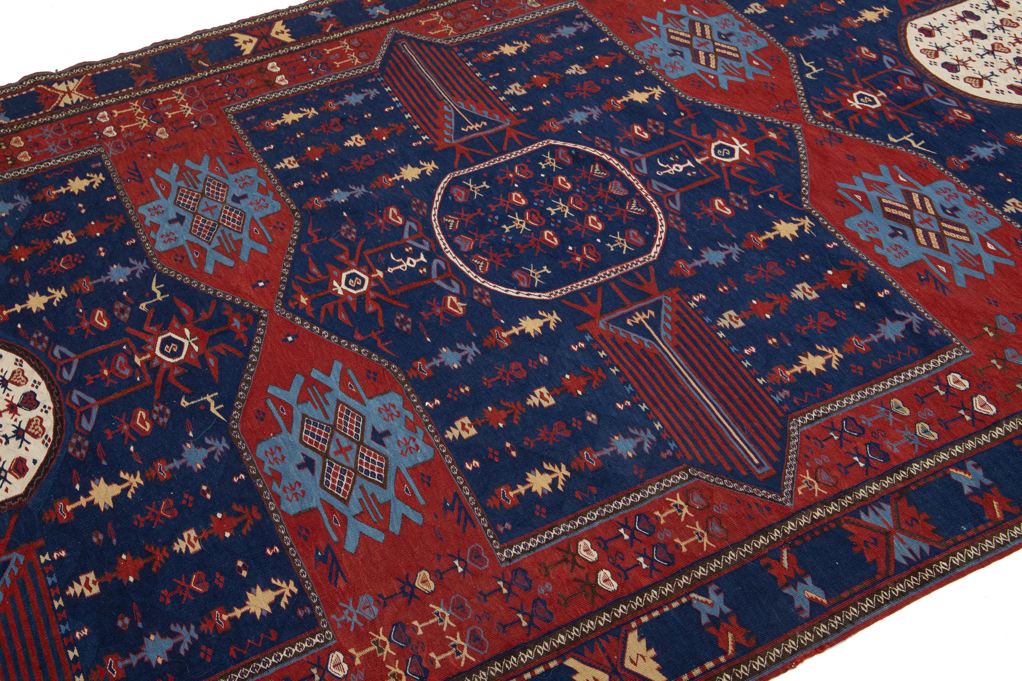 Antique Caucasian Dagestan Handmade Wool Runner In Blue Color With Tribal Motif In Excellent Condition For Sale In Norwalk, CT
