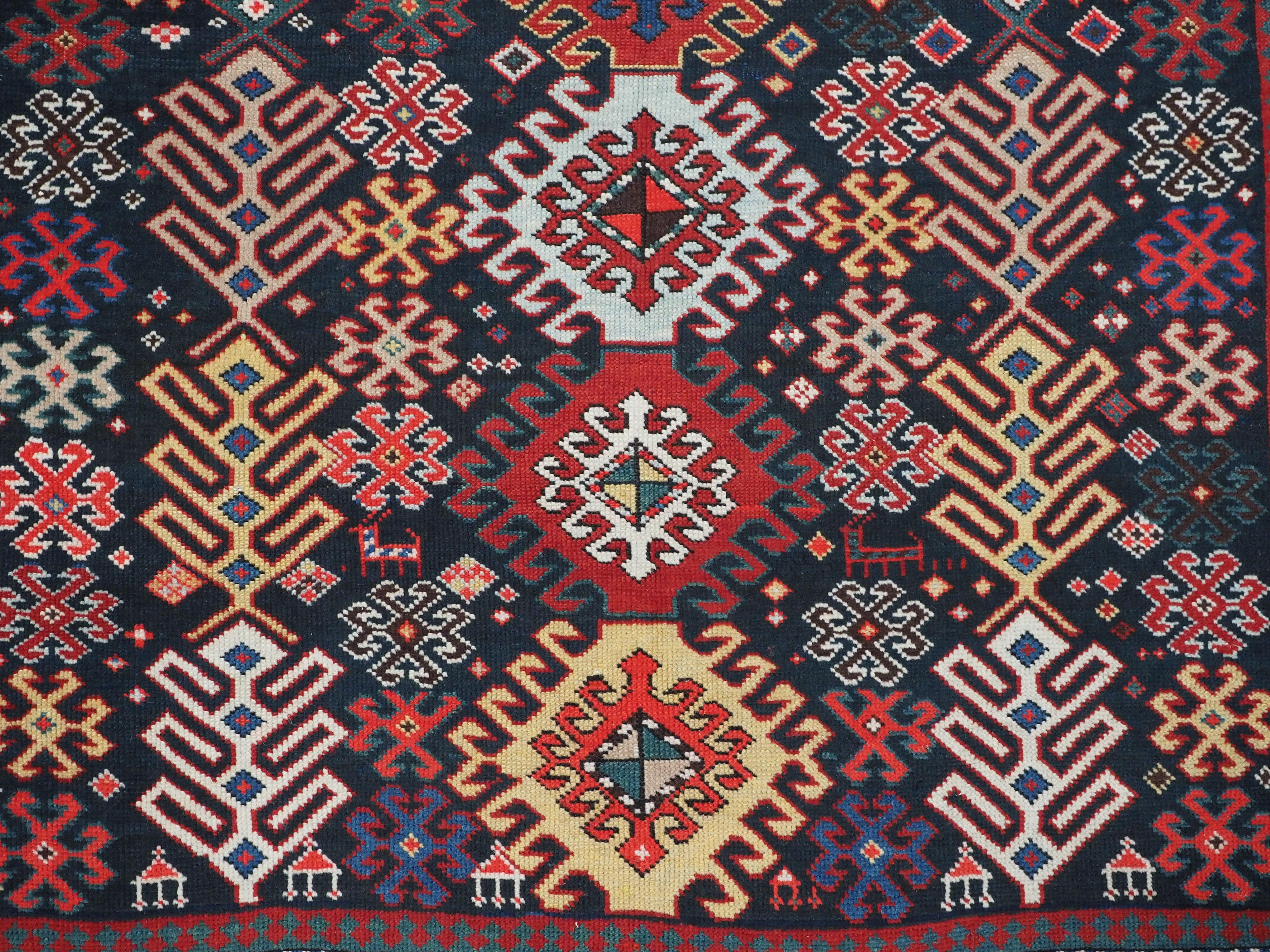 Antique Caucasian Dagestan long rug with hooked medallion design.  Circa 1890. For Sale 5