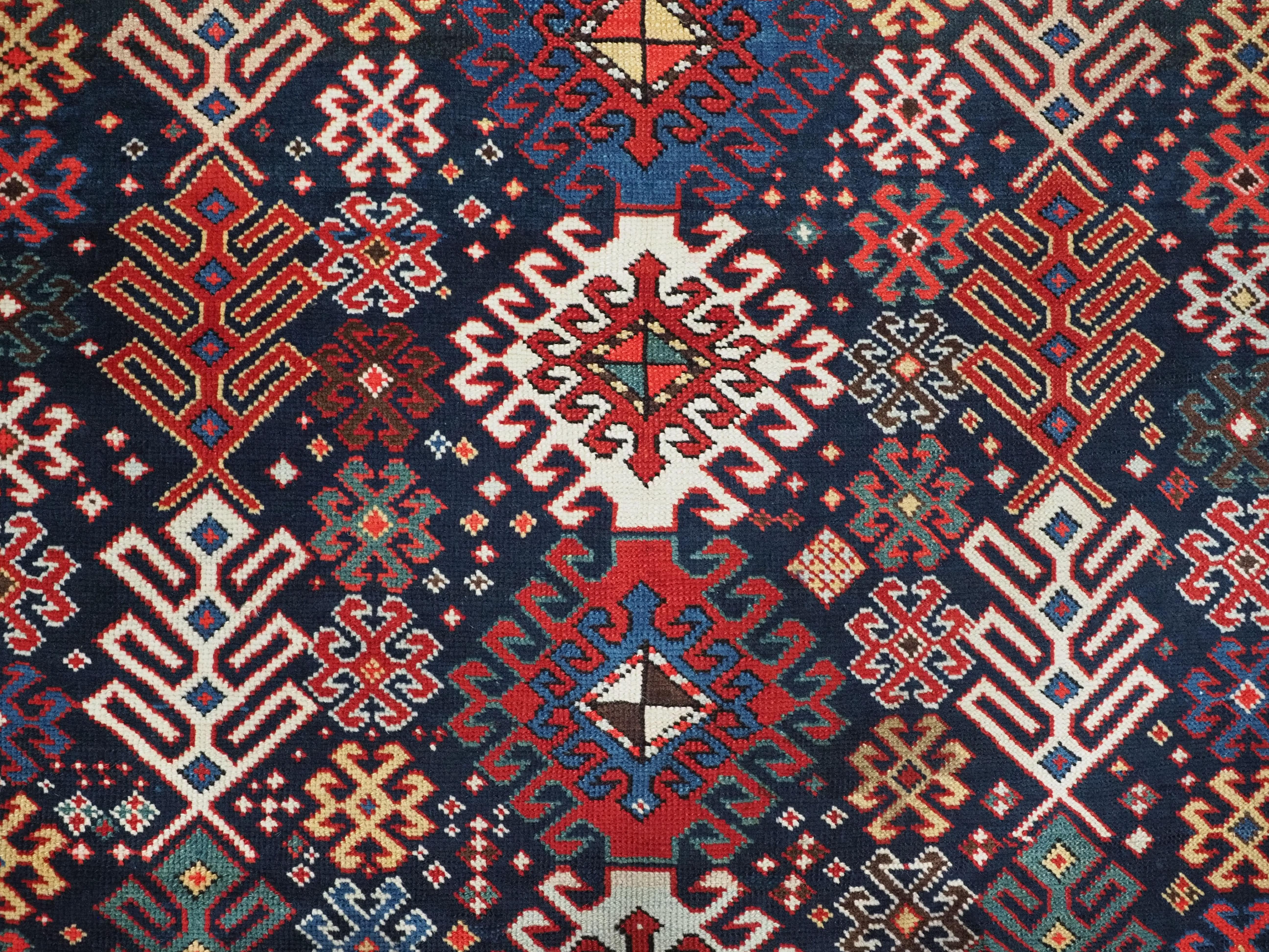 Antique Caucasian Dagestan long rug with hooked medallion design.  Circa 1890. For Sale 3