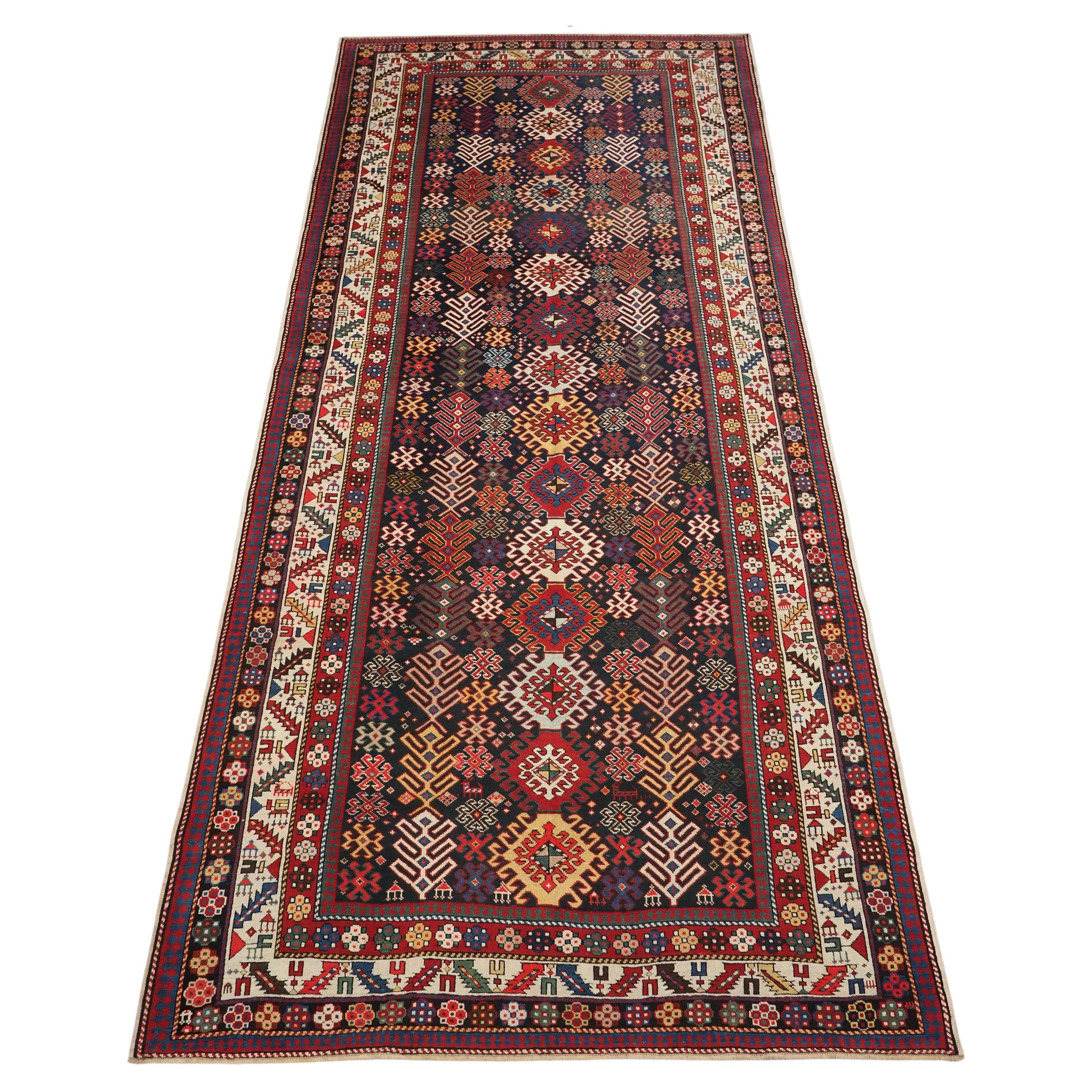 Antique Caucasian Dagestan long rug with hooked medallion design.  Circa 1890. For Sale