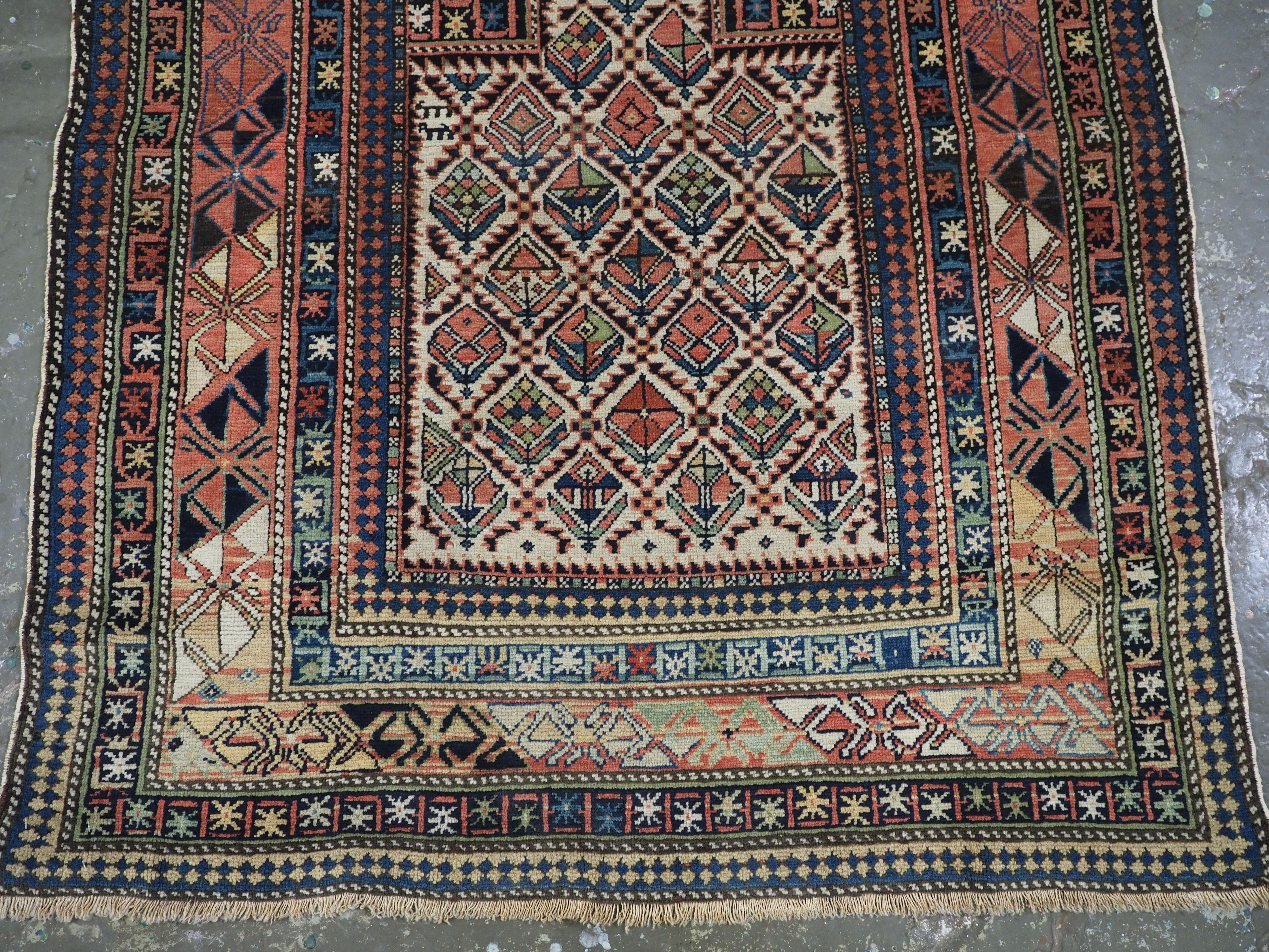 Late 19th Century Antique Caucasian Dagestan prayer rug with floral lattice on ivory ground, 1880. For Sale