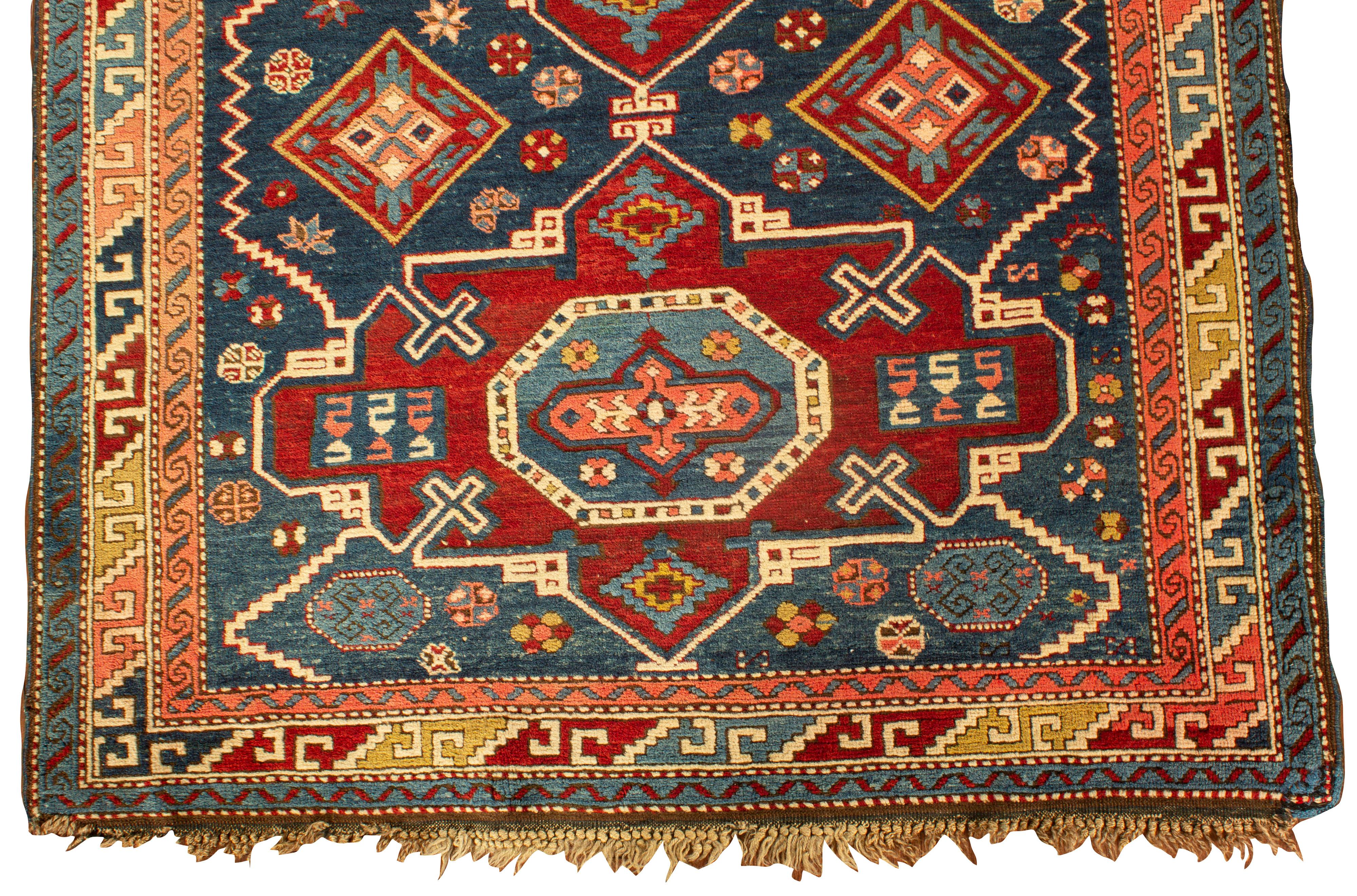 An antique circa 1890 Caucasian Dagestan rug, Dagestan is located inside Russia in the North of Caucasia, up until the 19th century it fell under the control of Persia, so the Persian influence can be seen in the weavings although they are of course