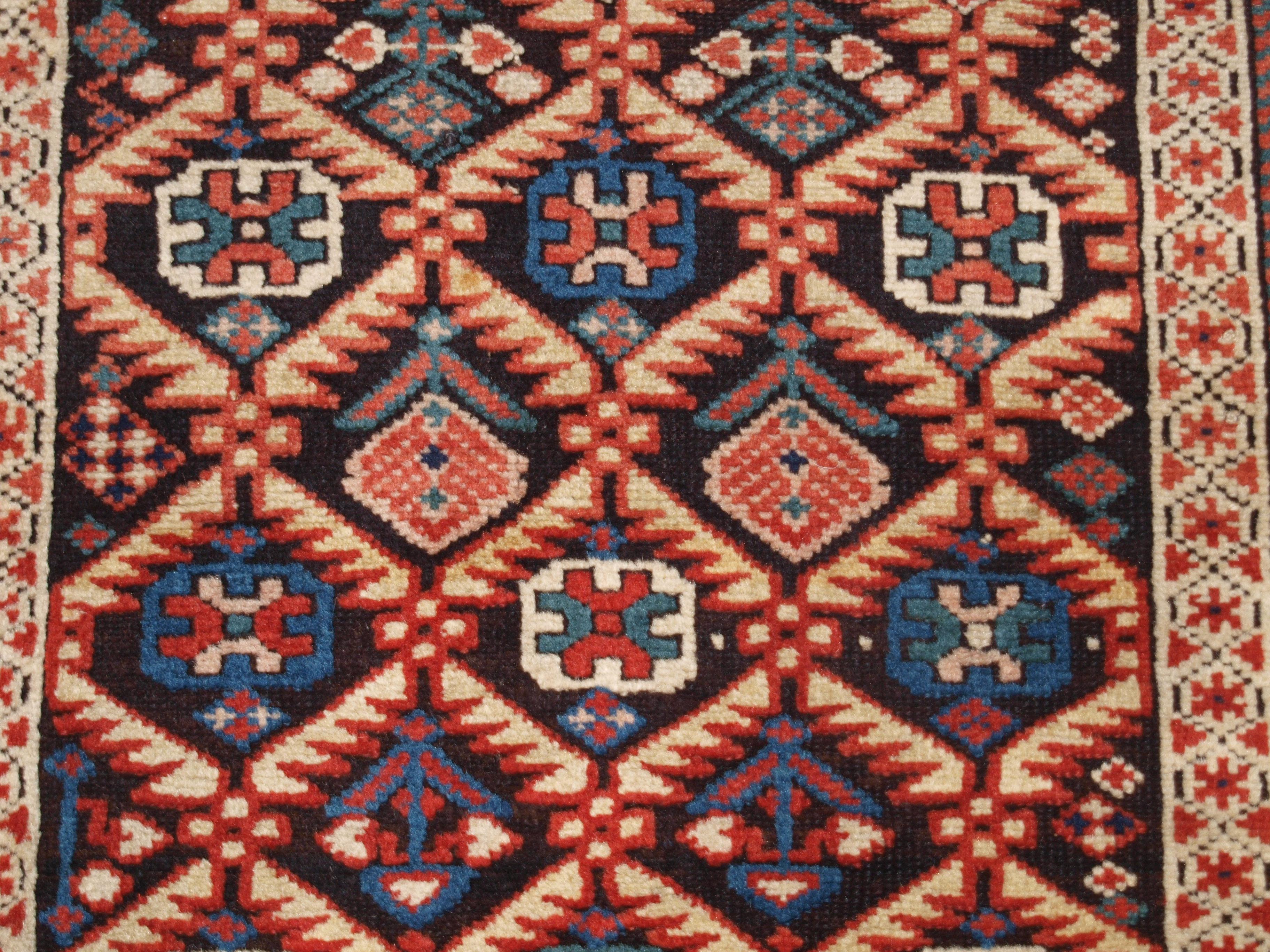 Antique Caucasian Dagestan Rug with Lattice Design on Dark Charcoal Ground 3