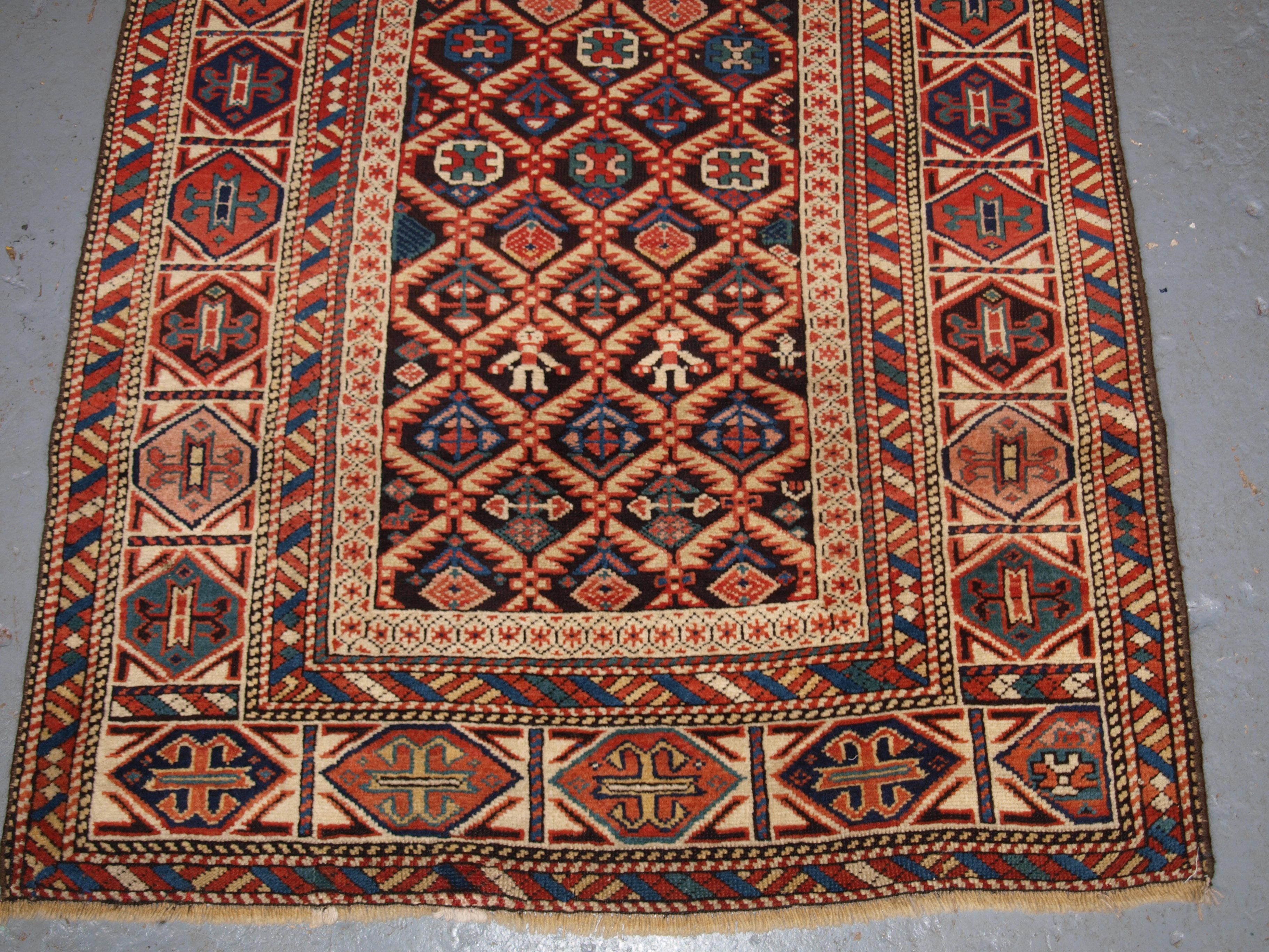 19th Century Antique Caucasian Dagestan Rug with Lattice Design on Dark Charcoal Ground